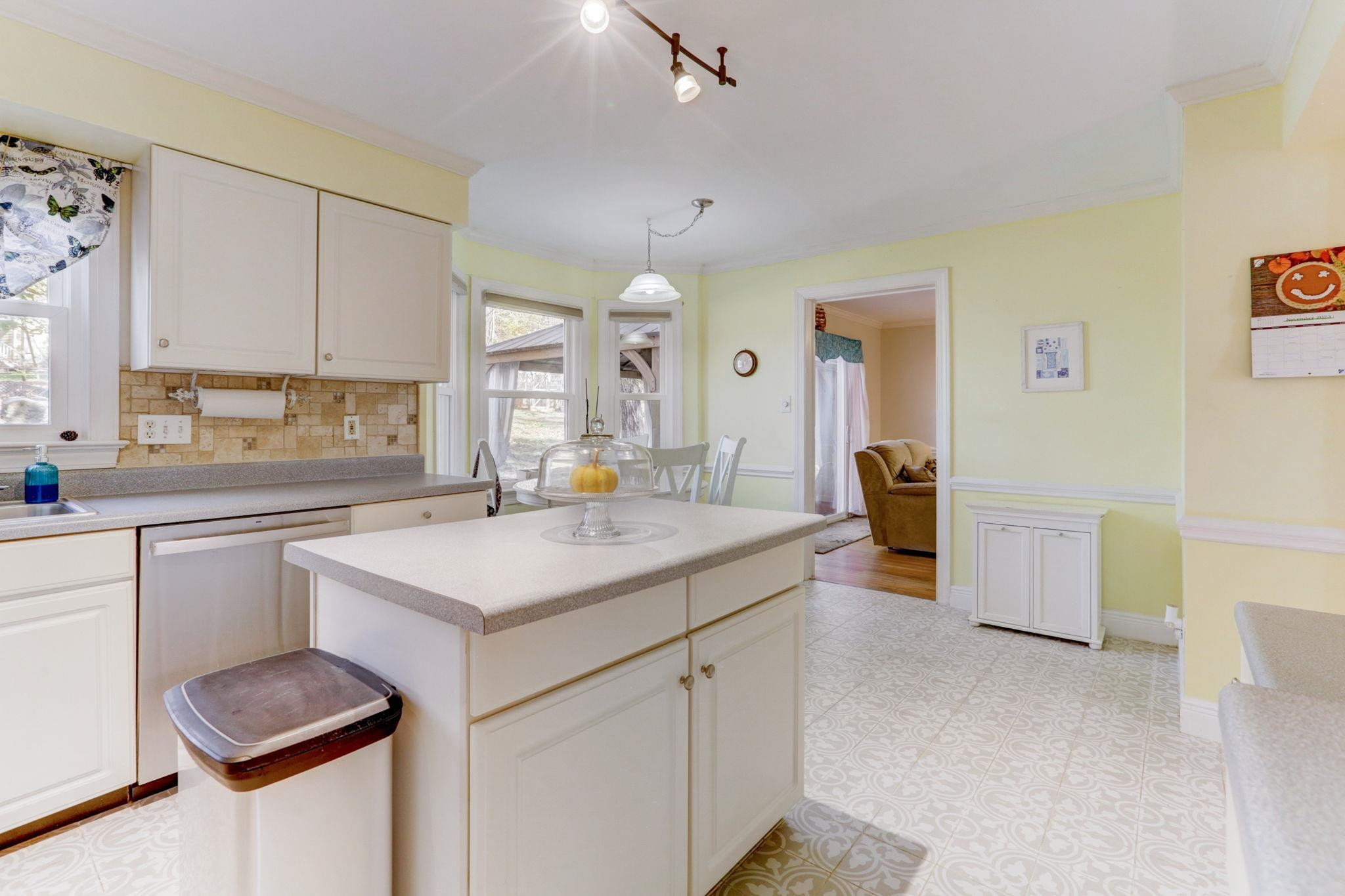 3 Danforth Place Durham, NC 27712 - Photo 15 of 38 a kitchen with a sink stove and cabinets