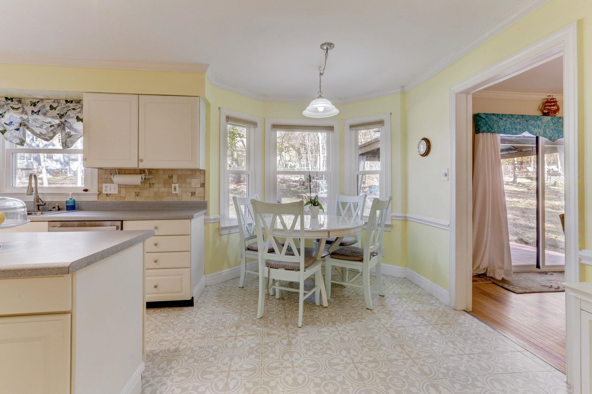 3 Danforth Place Durham, NC 27712 - Photo 16 of 38 a kitchen that has a lot of cabinets in it and appliances