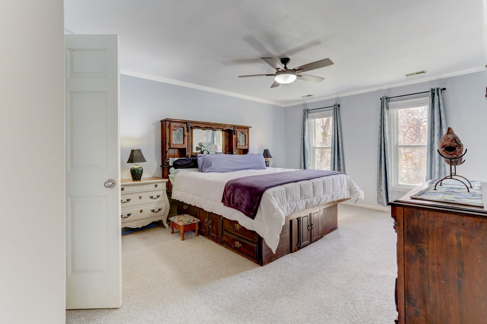3 Danforth Place Durham, NC 27712 - Photo 19 of 38 a bedroom with a bed and window