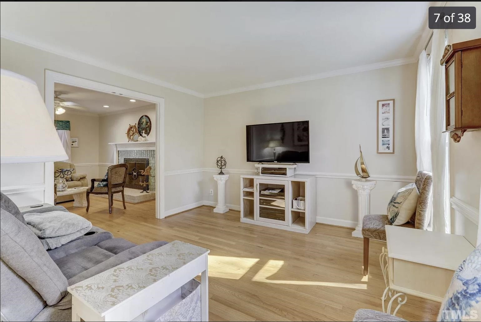3 Danforth Place Durham, NC 27712 - Photo 7 of 38 a living room with furniture and a flat screen tv