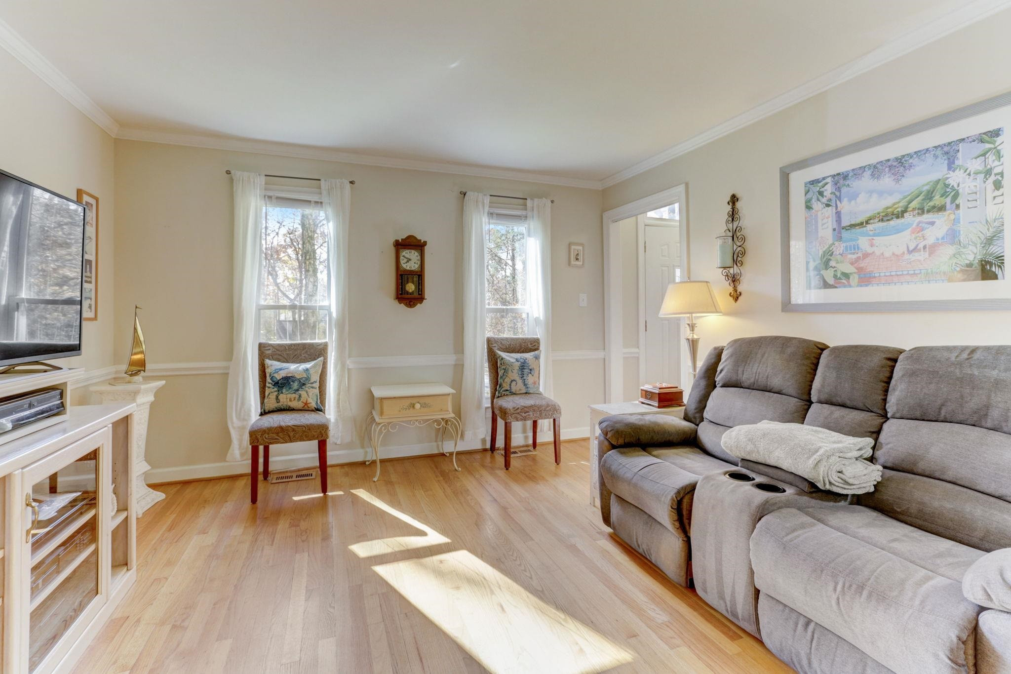 3 Danforth Place Durham, NC 27712 - Photo 8 of 38 a living room with furniture and a wooden floor