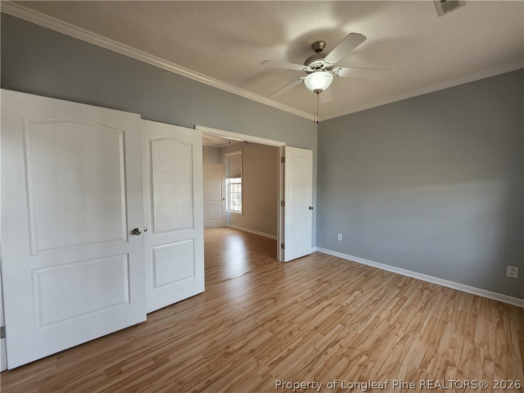 1324 Kershaw Loop, Unit 206 Fayetteville, NC 28314 - Photo 15 of 26 a view of an empty room and wooden floor