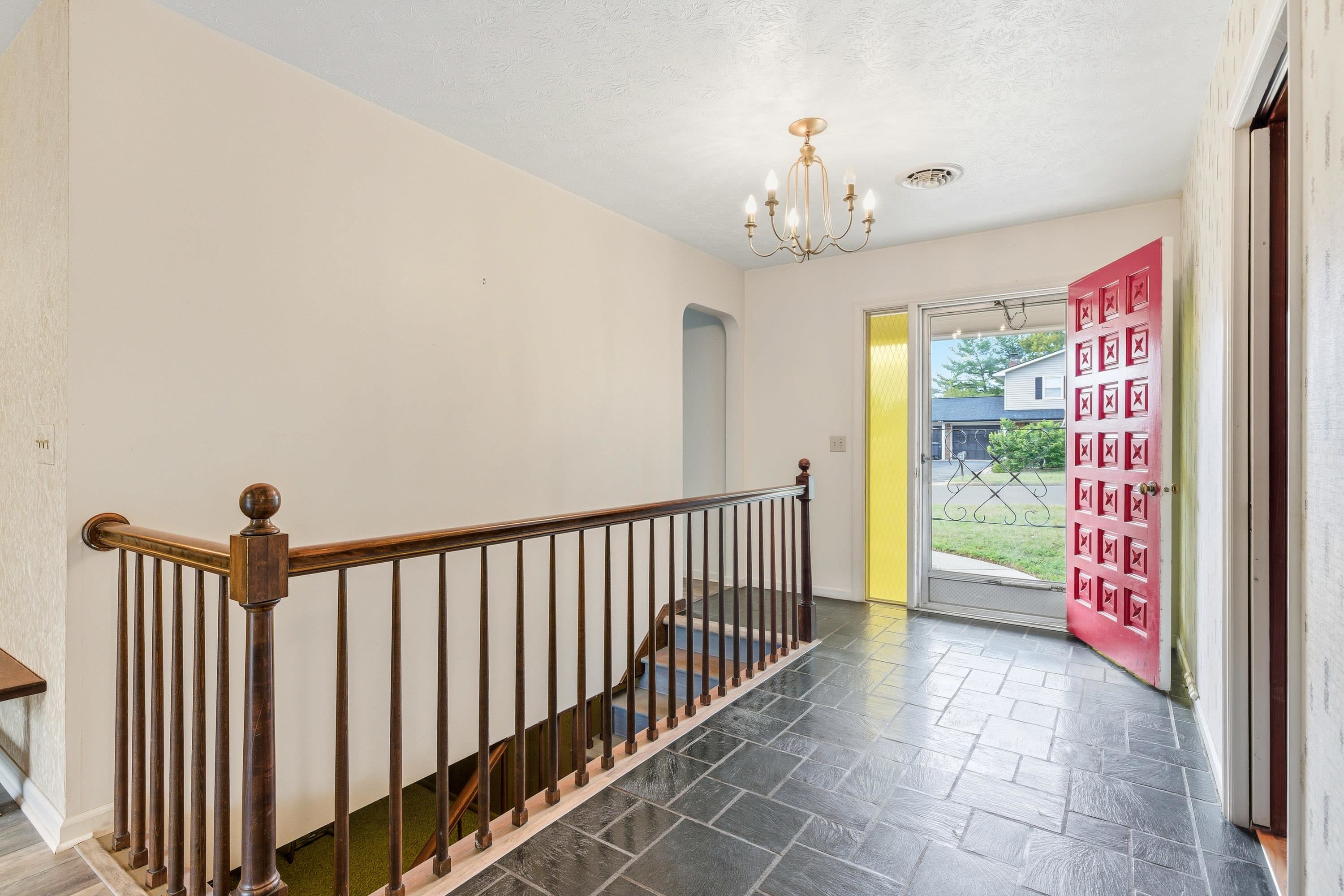 44 Emery Street Harrisonburg, VA 22801 - Photo 14 of 75 The front foyer space features slate tile and opens into the living areas of the home as the home office space.