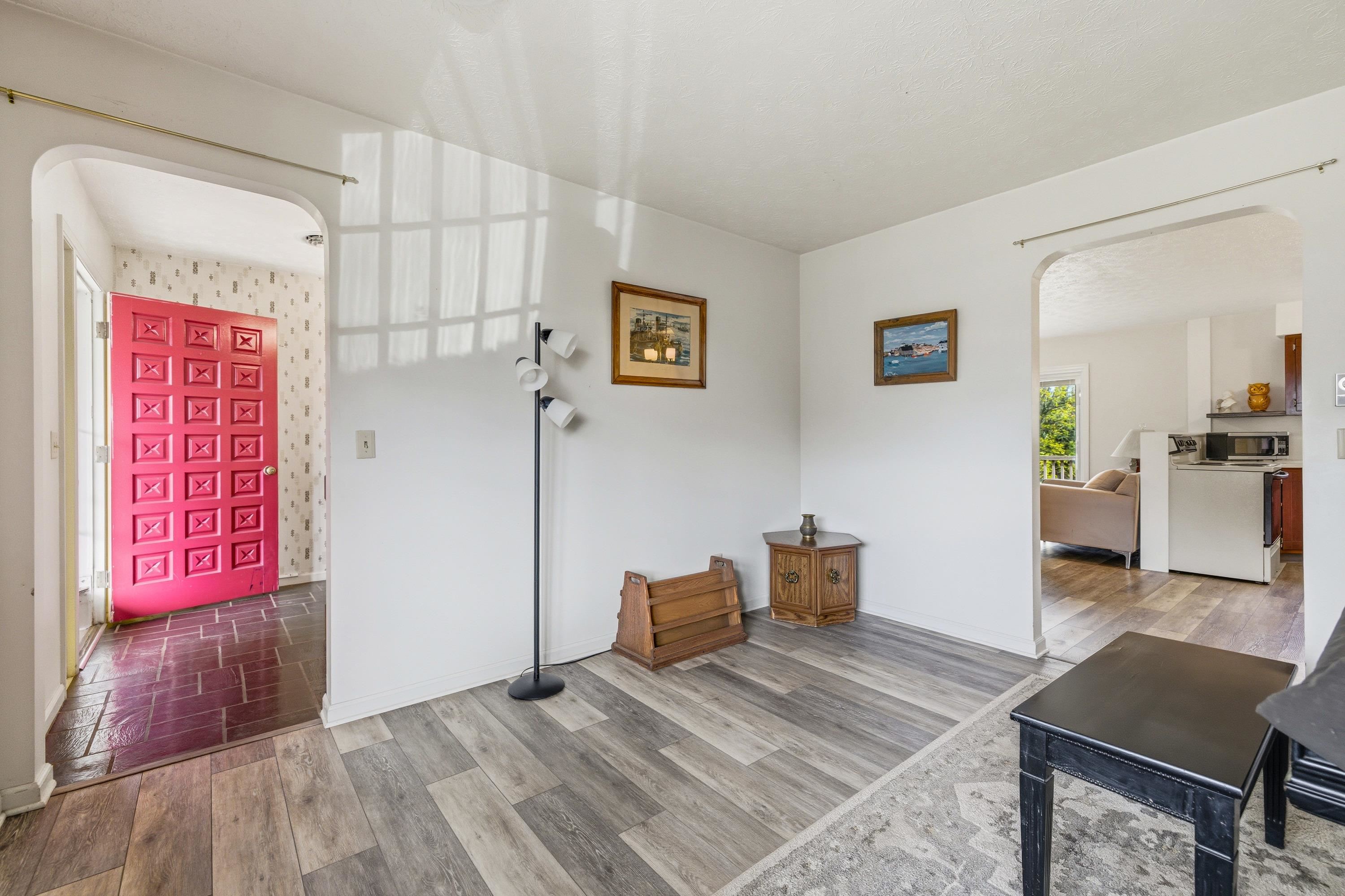 44 Emery Street Harrisonburg, VA 22801 - Photo 17 of 75 An additional, large, living area is located off the foyer and features laminant flooring throughout. The room also contains spacious windows and plenty of space for use as a family room, play room, craft room, and much more!