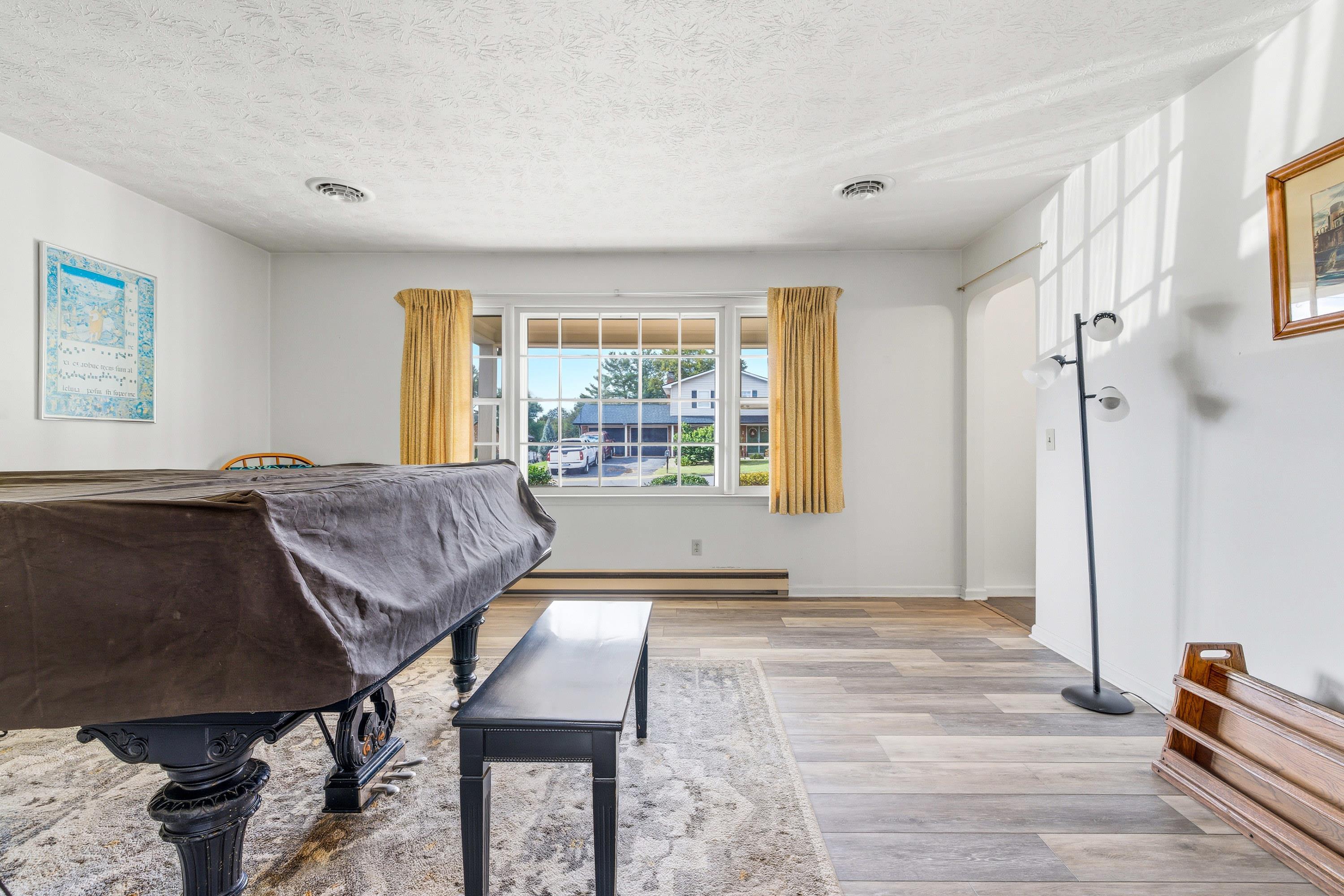 44 Emery Street Harrisonburg, VA 22801 - Photo 18 of 75 a living room with a bed furniture and a window