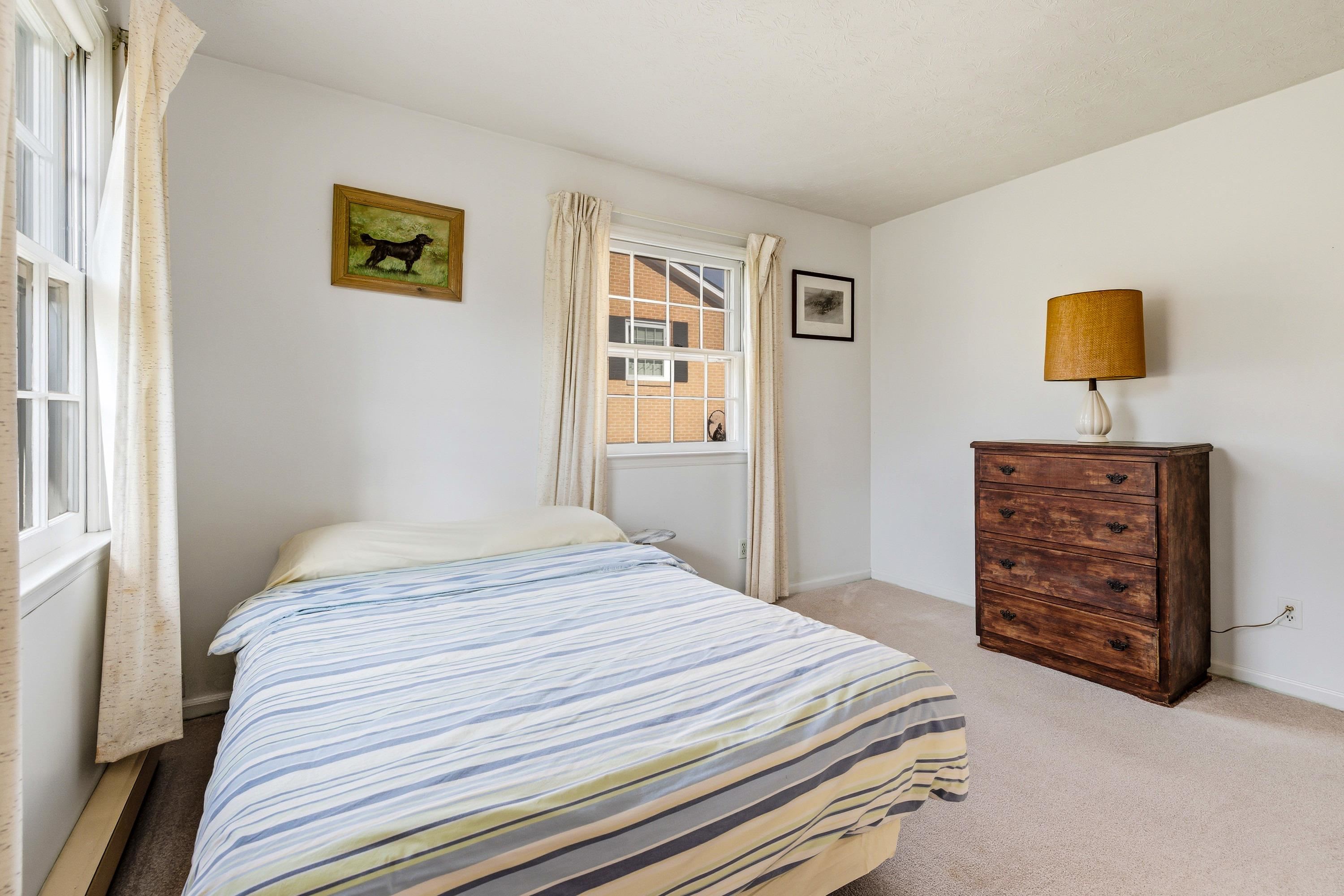44 Emery Street Harrisonburg, VA 22801 - Photo 25 of 75 a bedroom with a bed and a cabinets