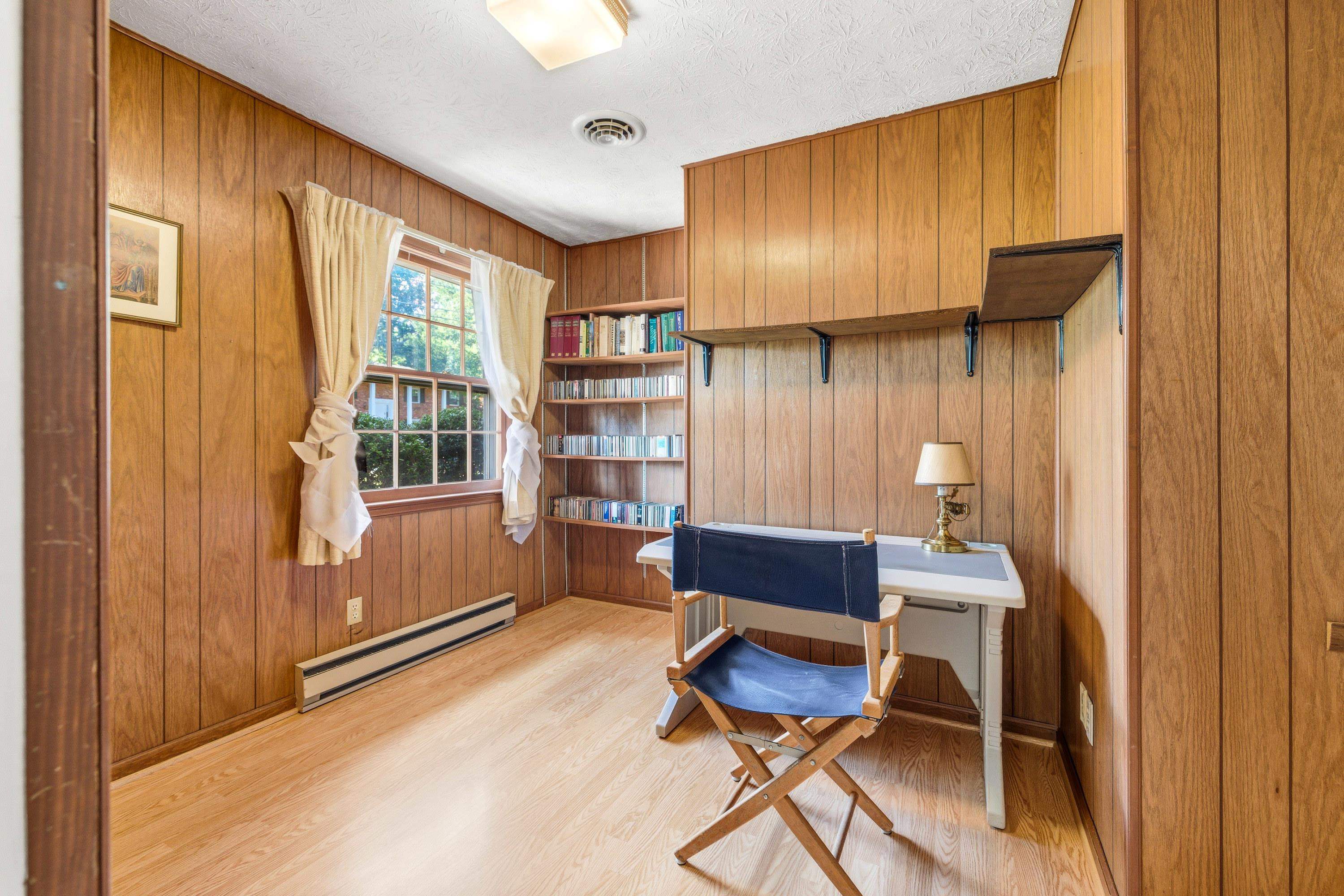 44 Emery Street Harrisonburg, VA 22801 - Photo 27 of 75 a workspace with furniture and window
