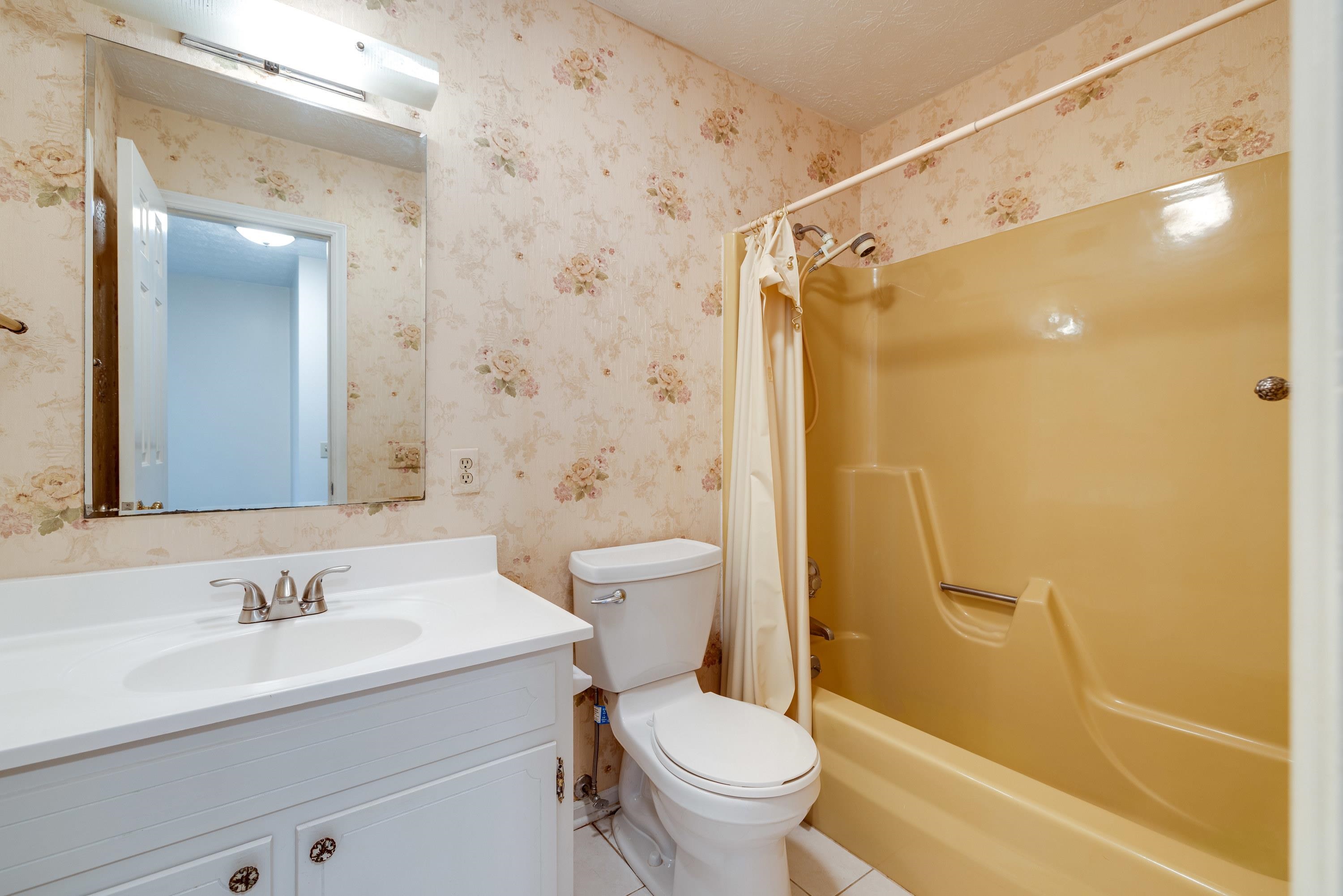 44 Emery Street Harrisonburg, VA 22801 - Photo 29 of 75 a bathroom with a sink toilet and shower
