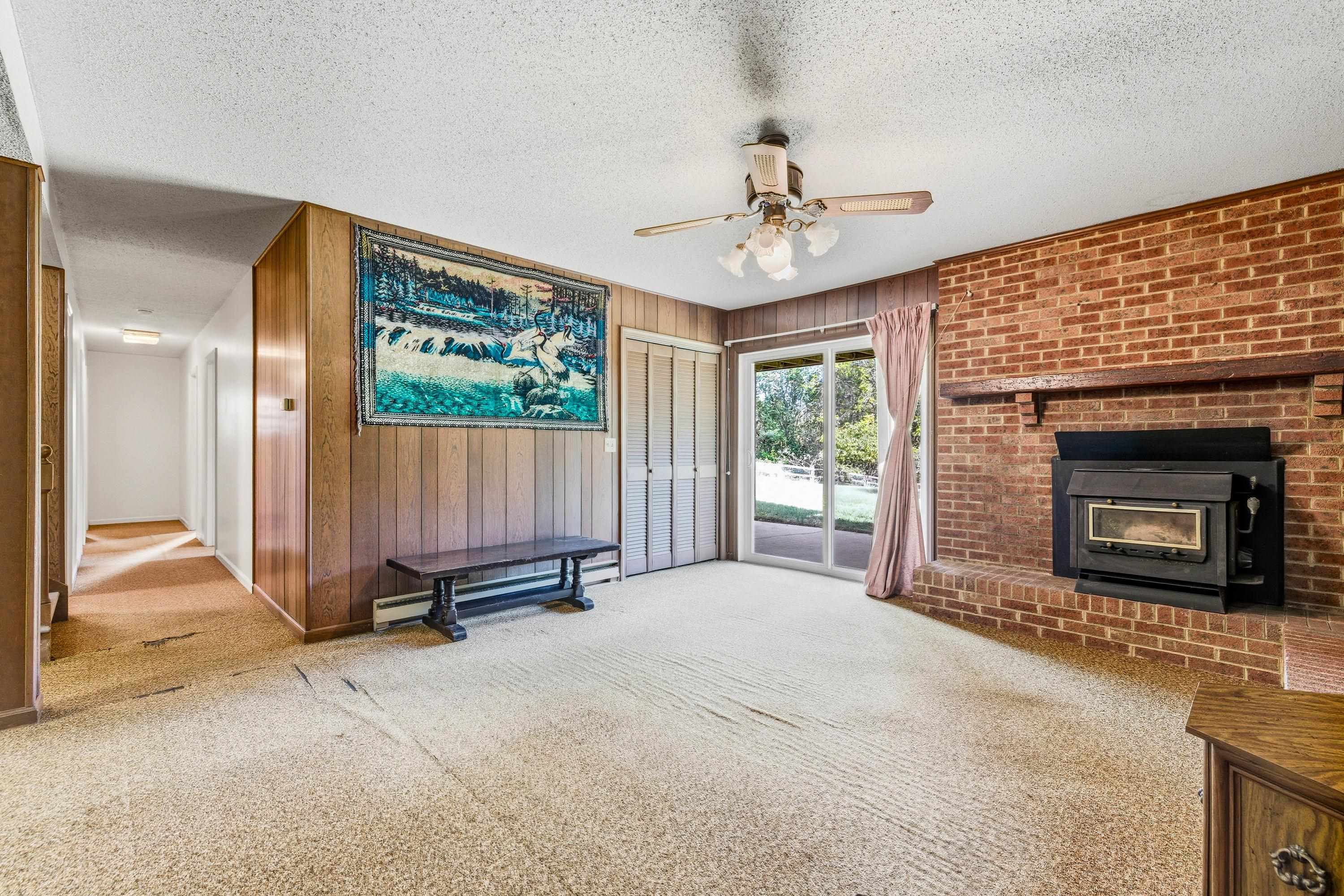 44 Emery Street Harrisonburg, VA 22801 - Photo 31 of 75 a view of a livingroom with furniture a fireplace and window