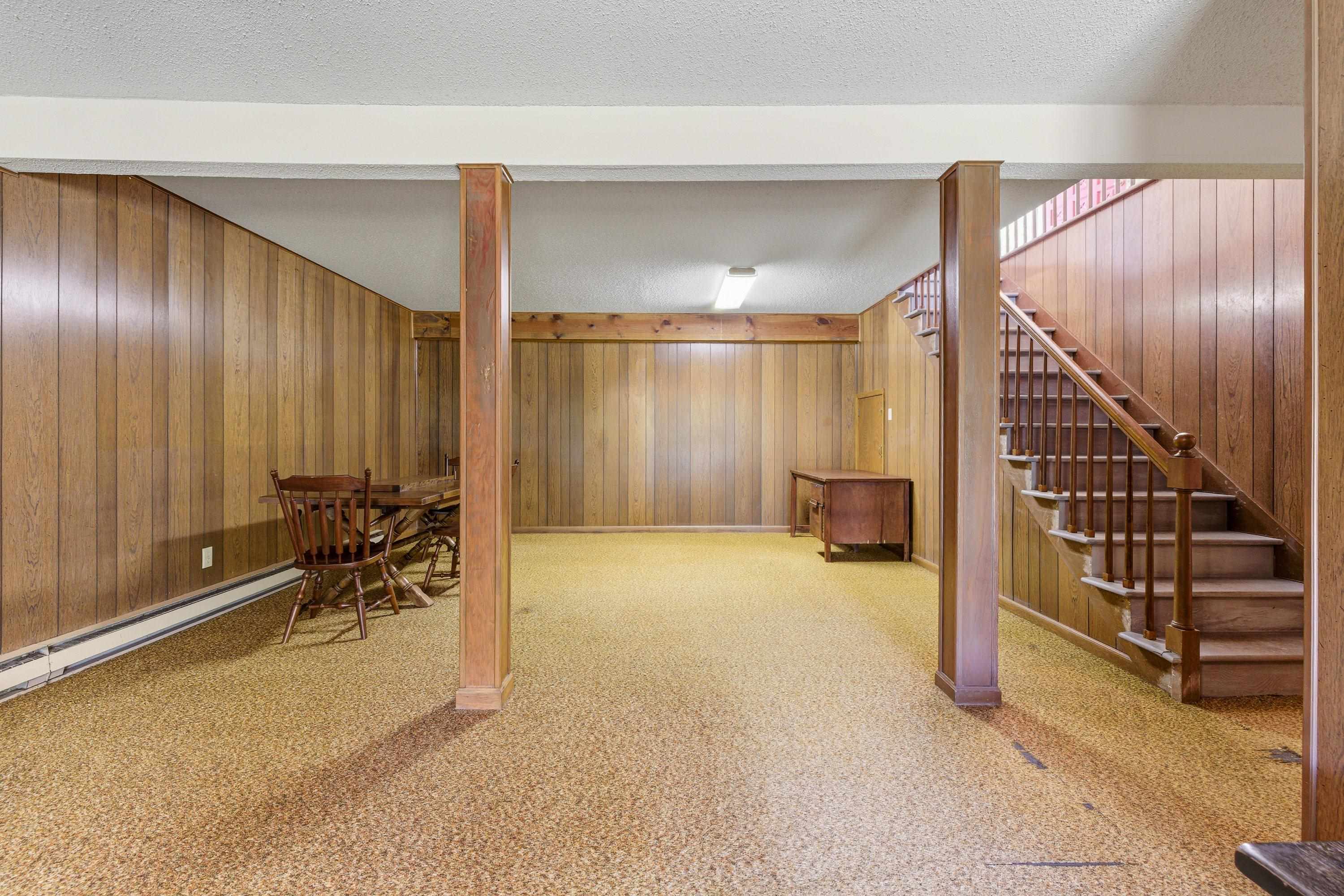 44 Emery Street Harrisonburg, VA 22801 - Photo 35 of 75 a view of a livingroom with furniture and staircase