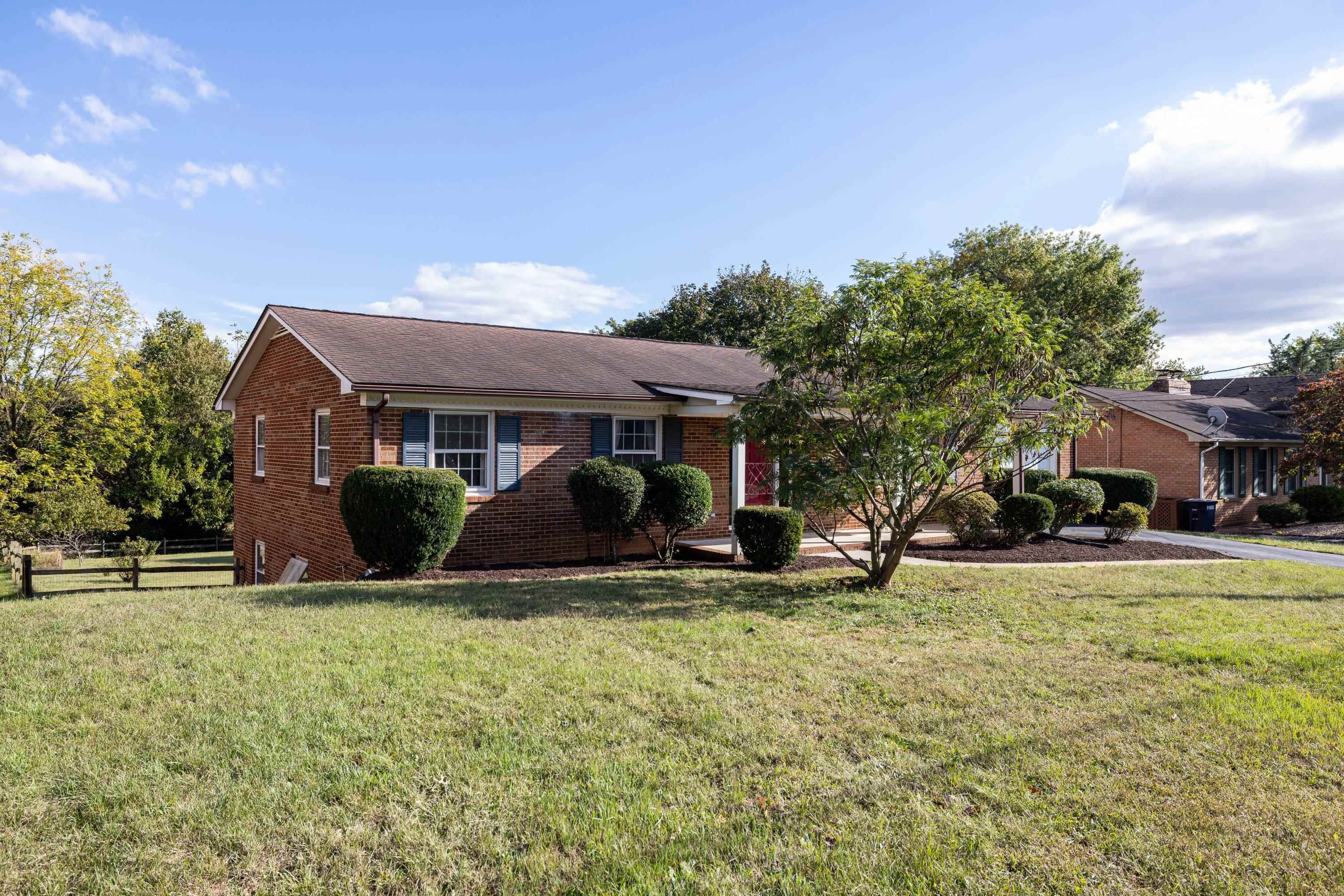 44 Emery Street Harrisonburg, VA 22801 - Photo 48 of 75 a view of a house with a yard and sitting area