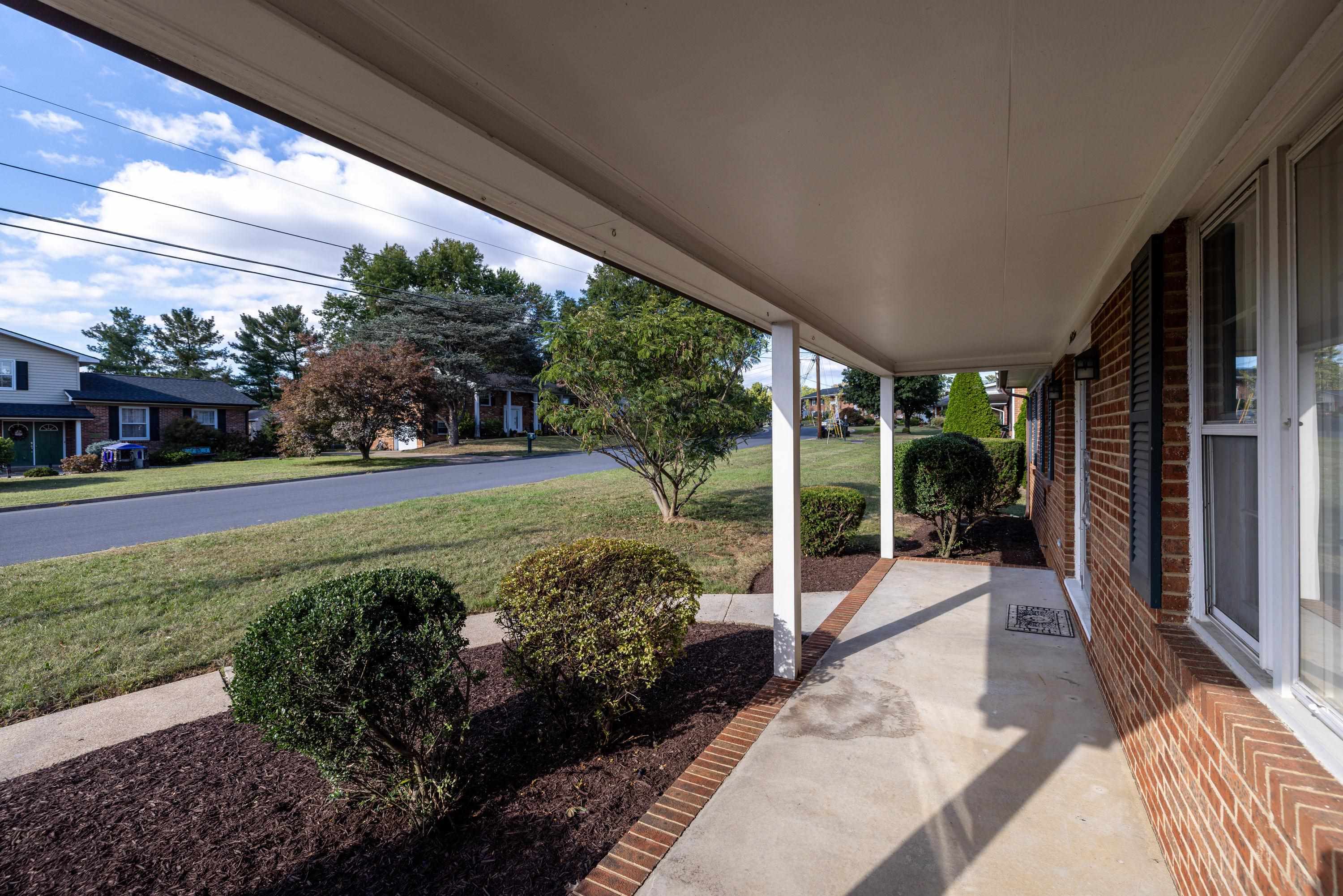 44 Emery Street Harrisonburg, VA 22801 - Photo 57 of 75 The large front porch is perfect for gathering with friends and family and overlooks the large front yard. The front porch also highlights the brick exterior of this home.