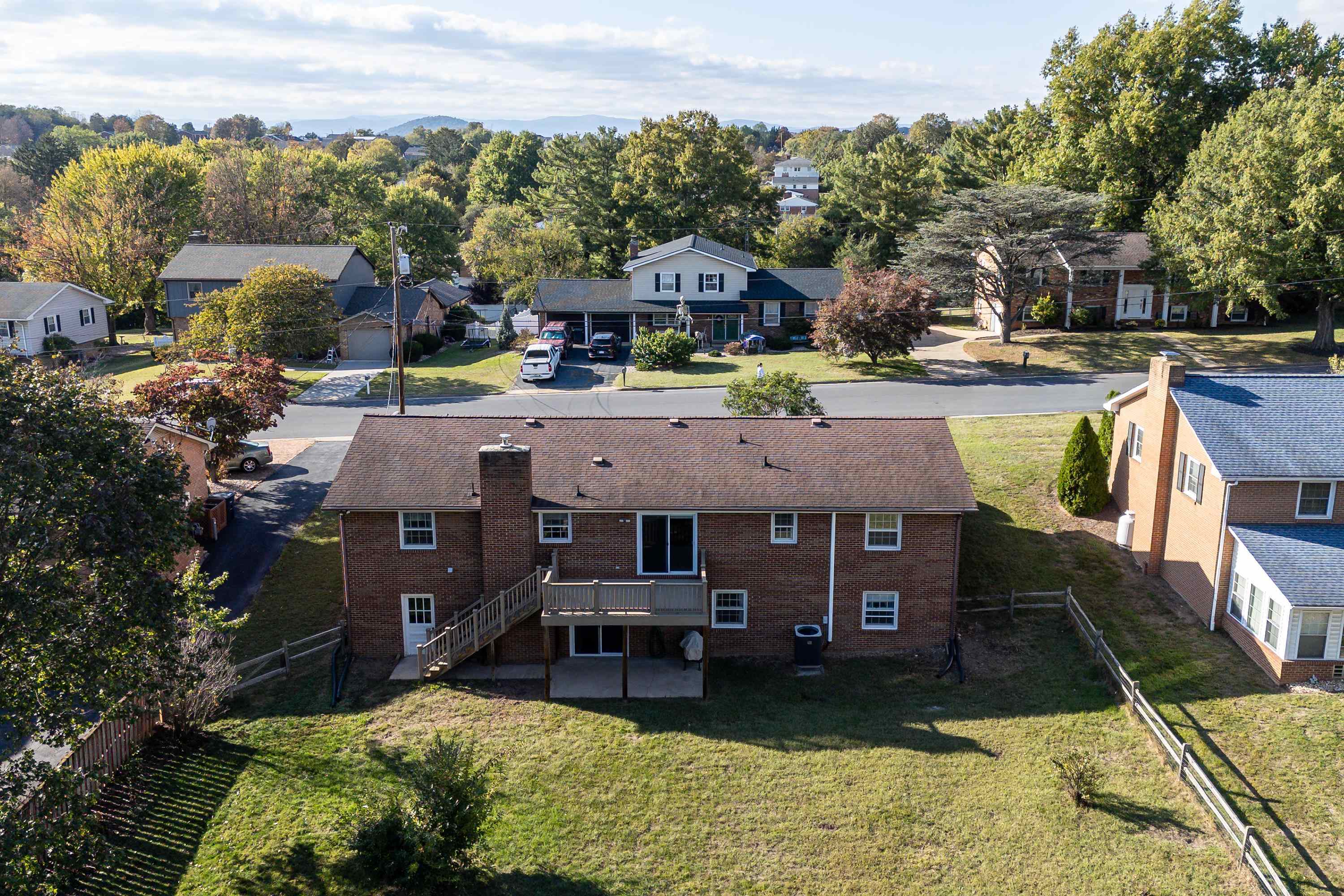 44 Emery Street Harrisonburg, VA 22801 - Photo 59 of 75 a view of a lake with a house in the background