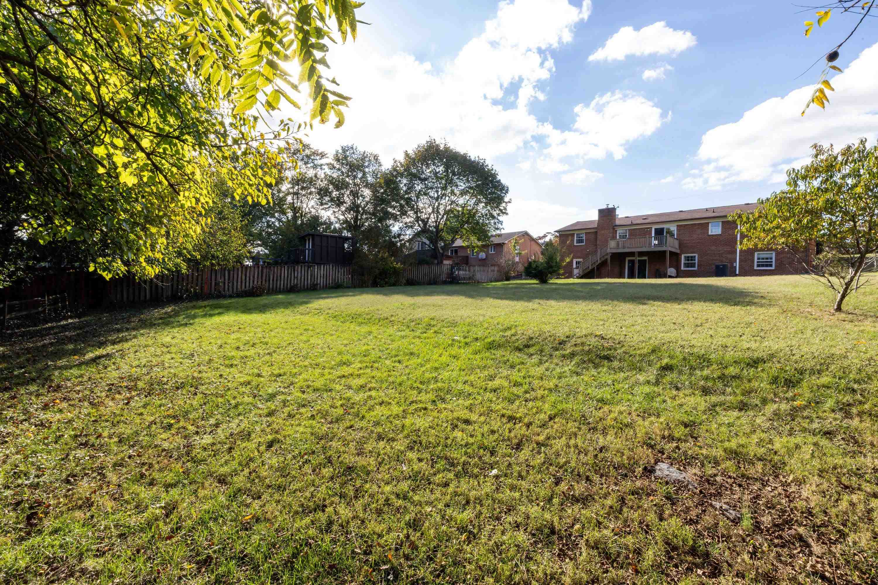 44 Emery Street Harrisonburg, VA 22801 - Photo 70 of 75 a view of a field with a trees in the background