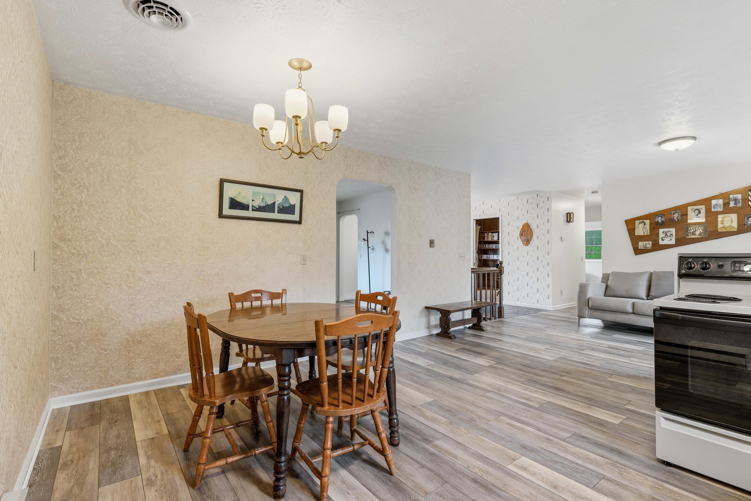 44 Emery Street Harrisonburg, VA 22801 - Photo 7 of 75 a view of a dining room with furniture and wooden floor