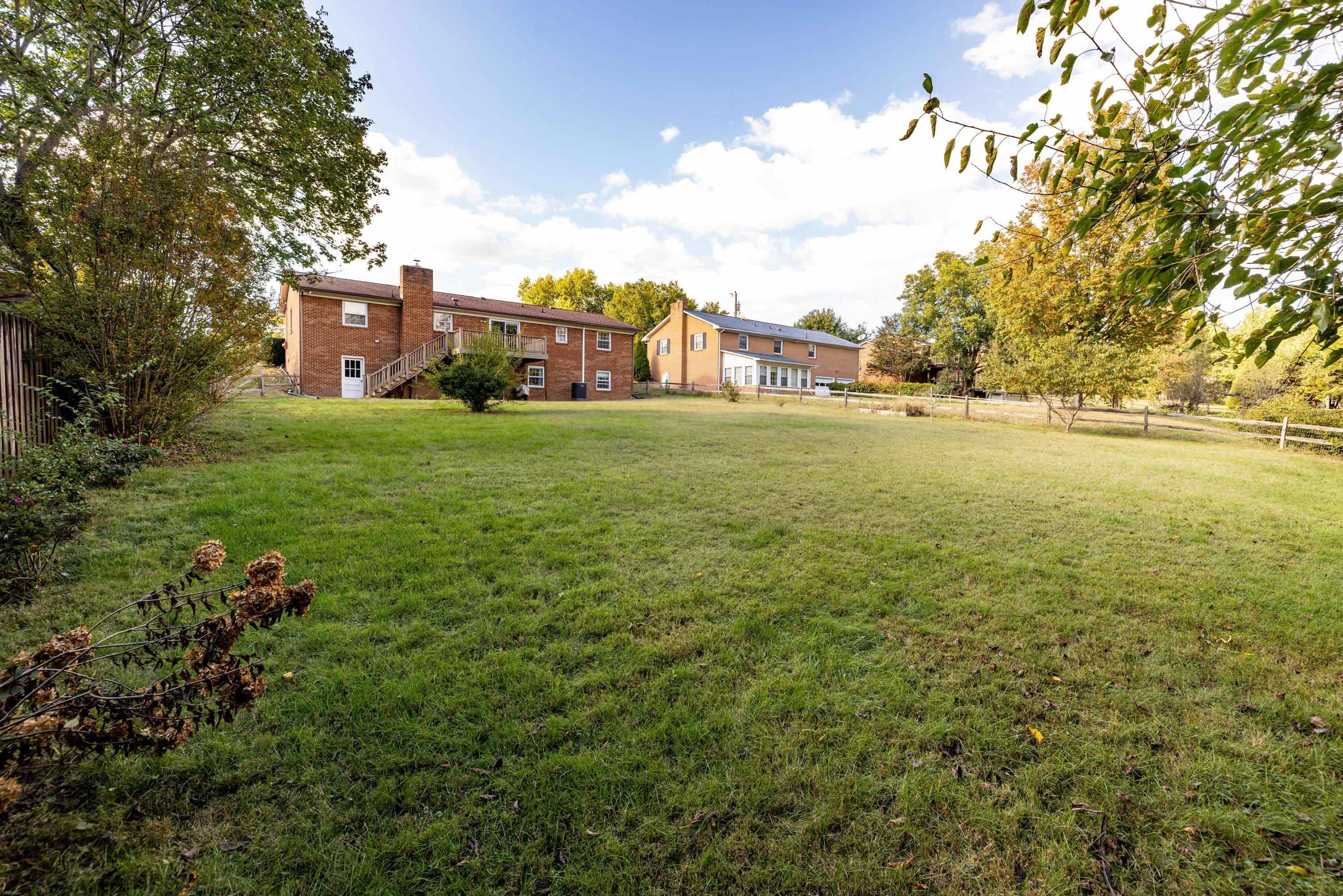 44 Emery Street Harrisonburg, VA 22801 - Photo 71 of 75 a view of a large garden with plants and large trees