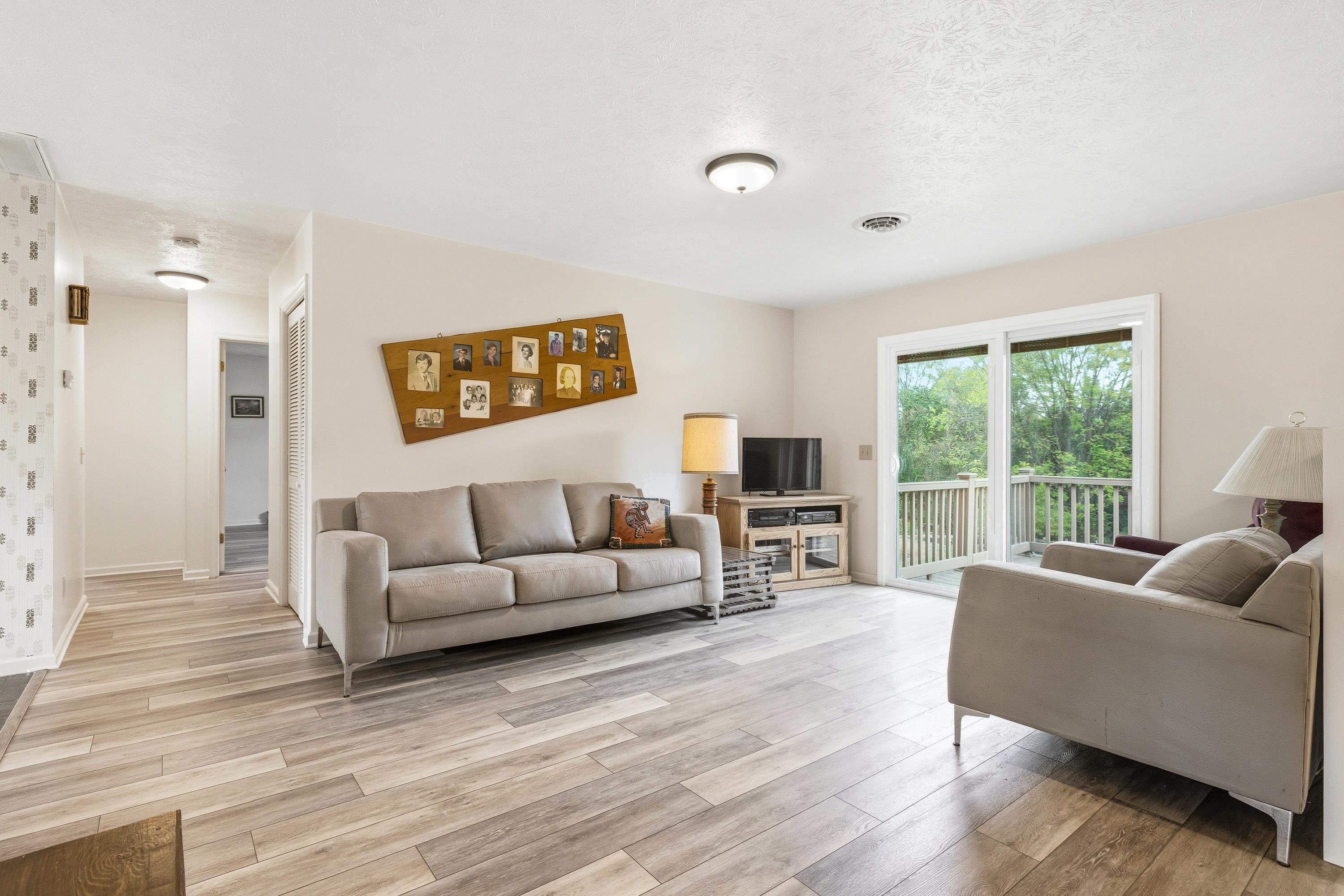 44 Emery Street Harrisonburg, VA 22801 - Photo 10 of 75 a living room with furniture and a large window