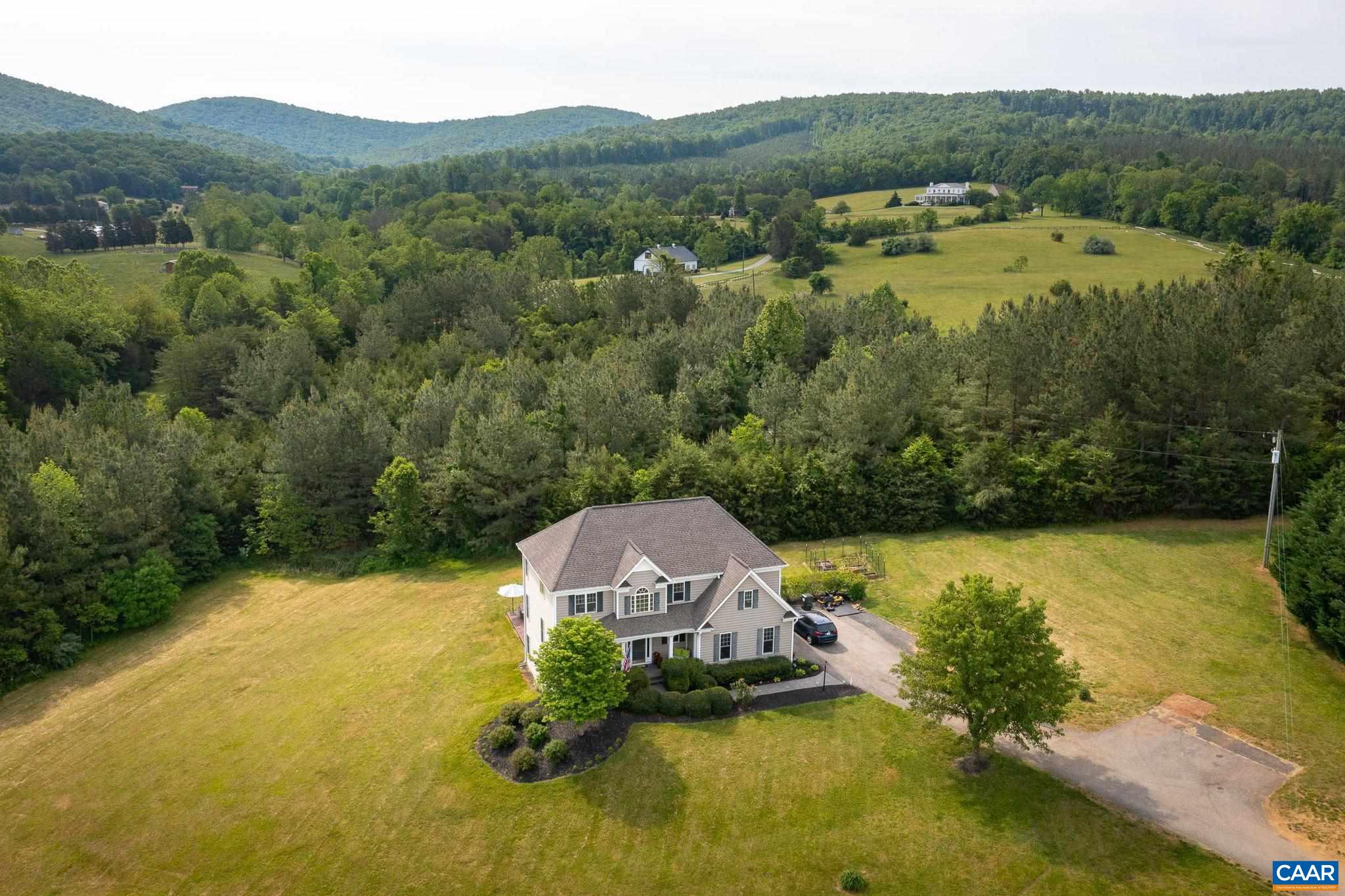 4271 Stony Point Road Keswick, VA 22947 - Photo 59 of 68 a view of a lake with a mountain