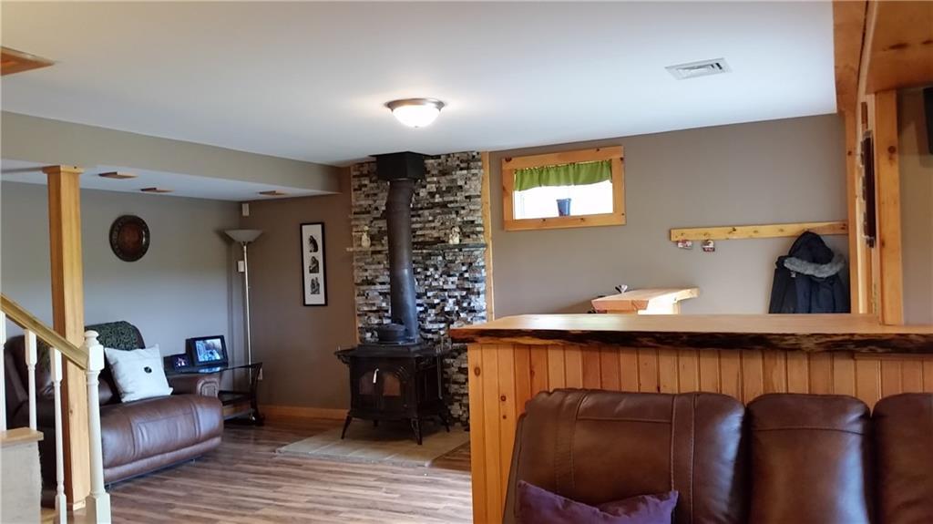 235 Royalsborough Road Durham, ME 04222 - Photo 30 of 35 Wood stove to warm up the family room!