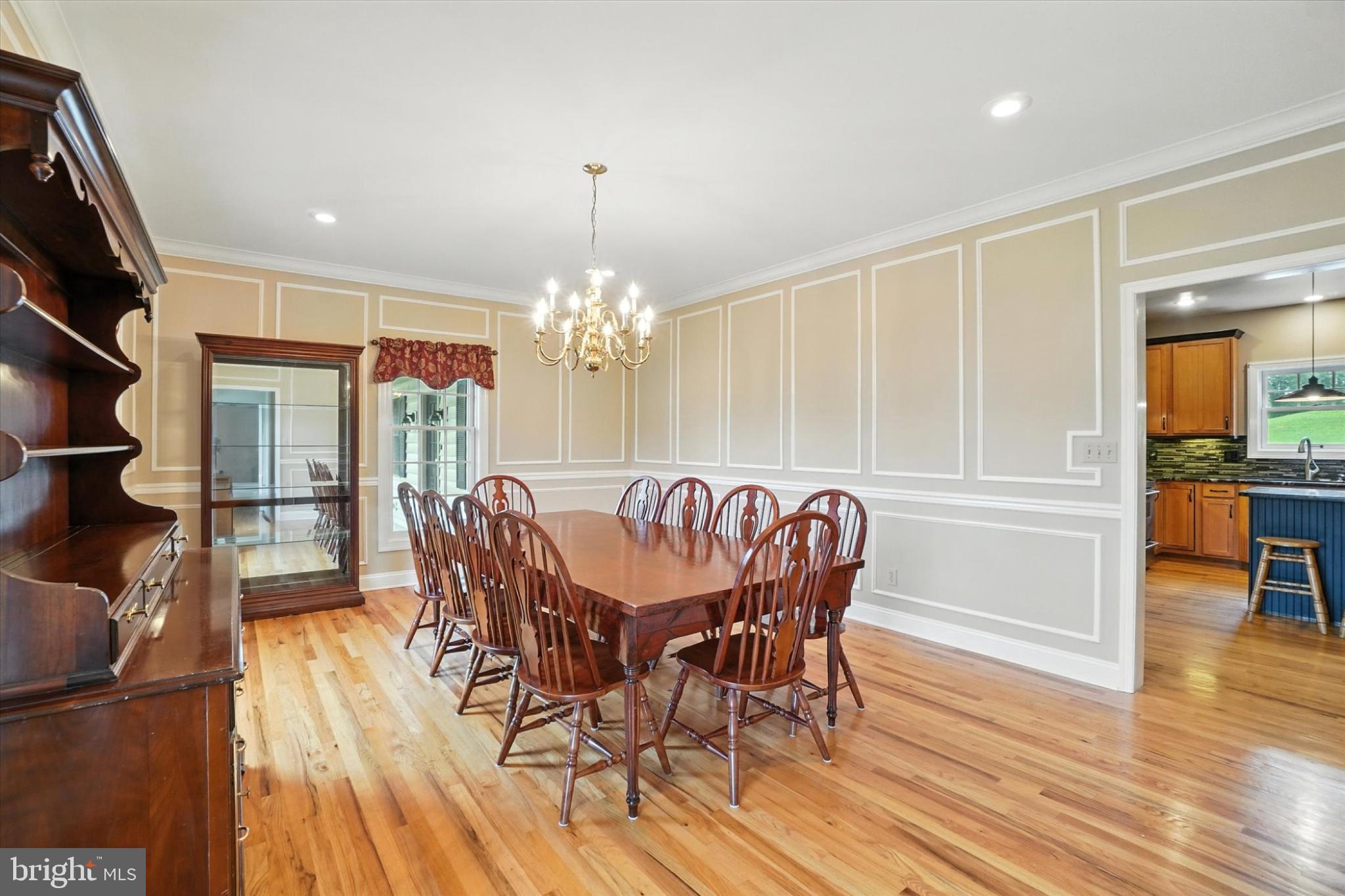 160 Vida Lane Dover, PA 17315 - Photo 21 of 61 a dining room with furniture a chandelier and wooden floor