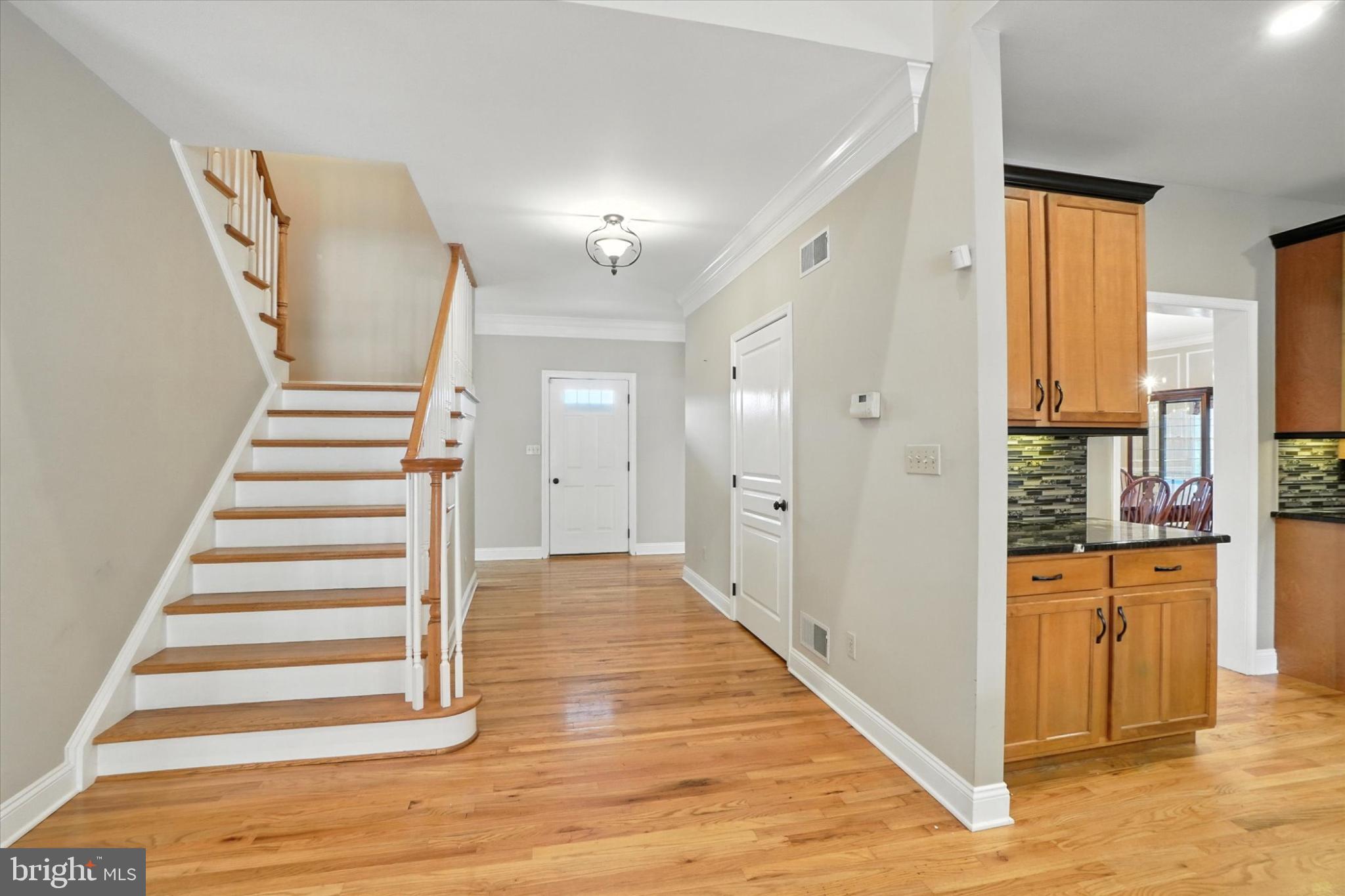 160 Vida Lane Dover, PA 17315 - Photo 26 of 61 a view of a hallway with wooden floor and staircase
