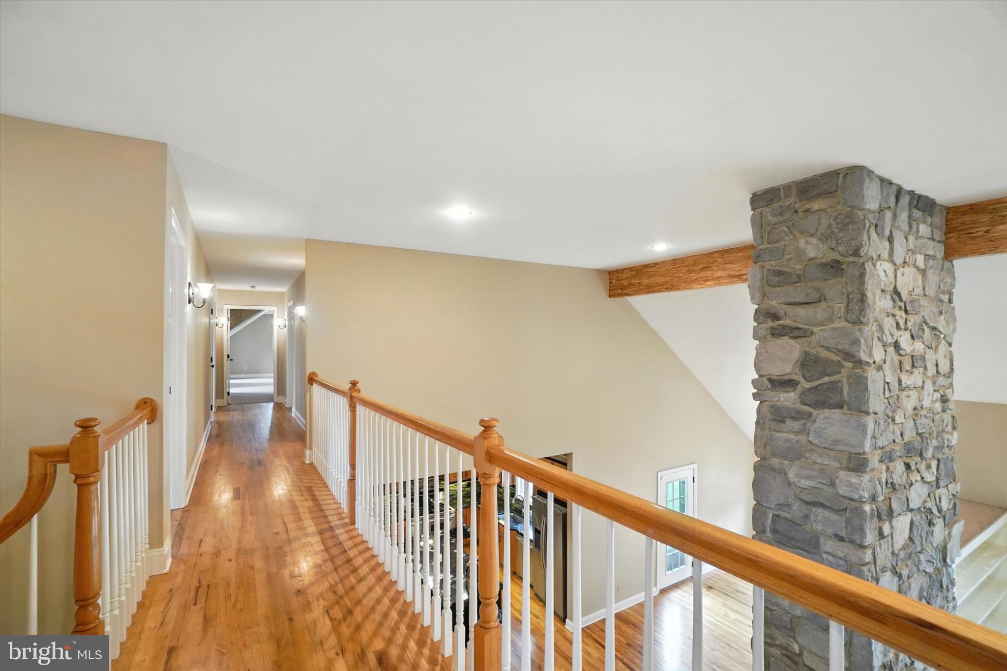 160 Vida Lane Dover, PA 17315 - Photo 27 of 61 a view of a hallway with wooden floor and staircase