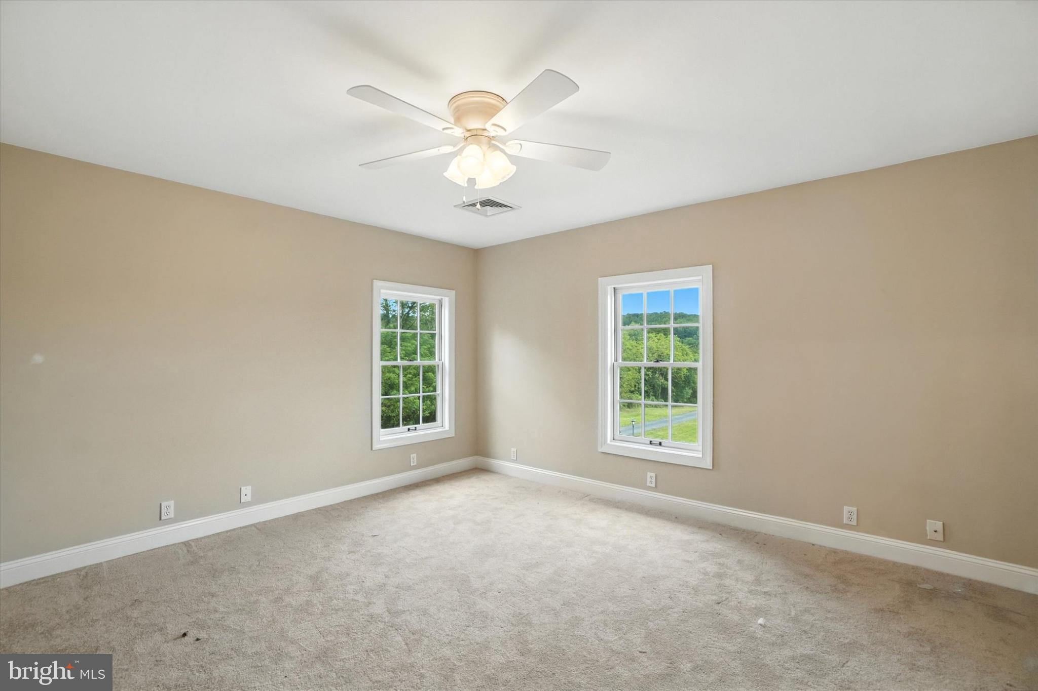 160 Vida Lane Dover, PA 17315 - Photo 28 of 61 an empty room with windows and fan