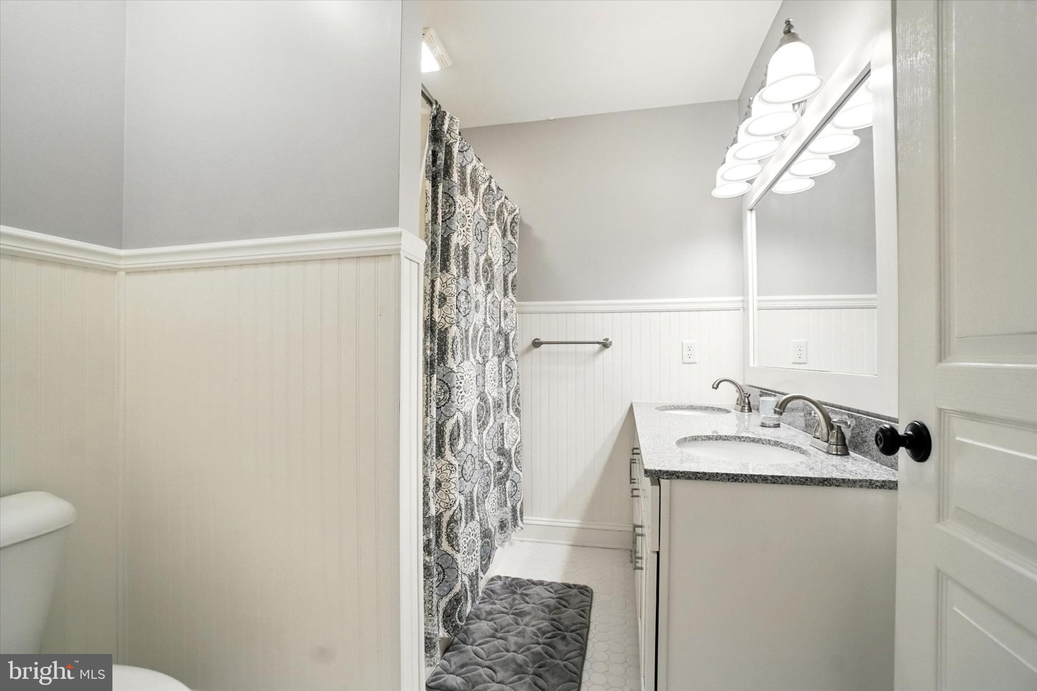 160 Vida Lane Dover, PA 17315 - Photo 36 of 61 a bathroom with a granite countertop shower and a sink