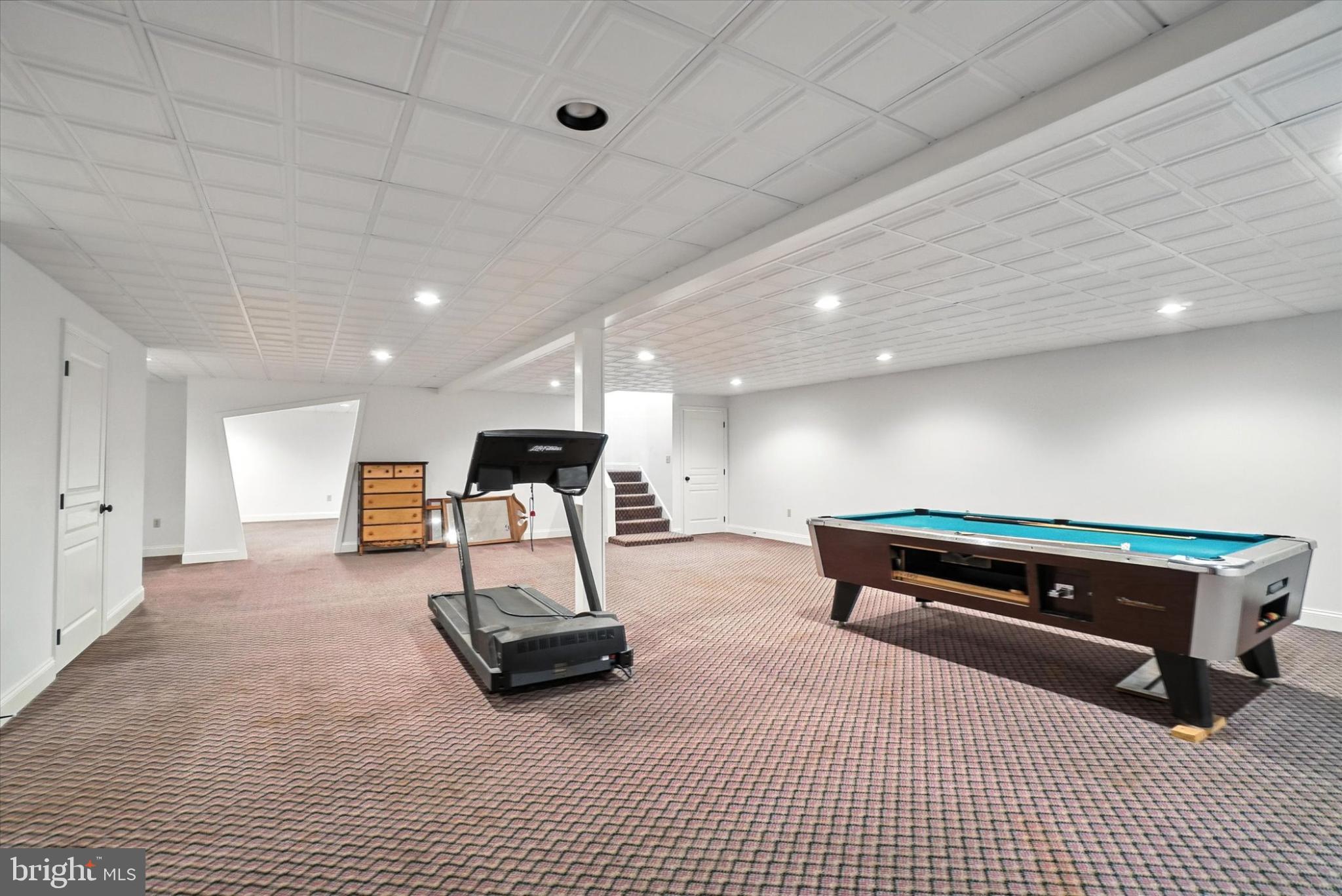 160 Vida Lane Dover, PA 17315 - Photo 38 of 61 a room with gym equipment and a table