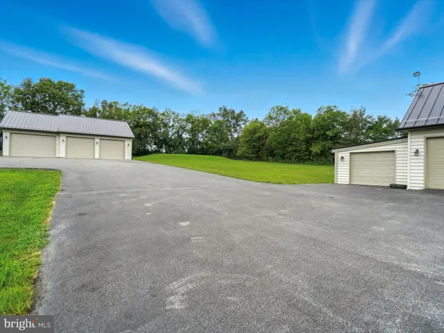 a view of a lake with houses in the background