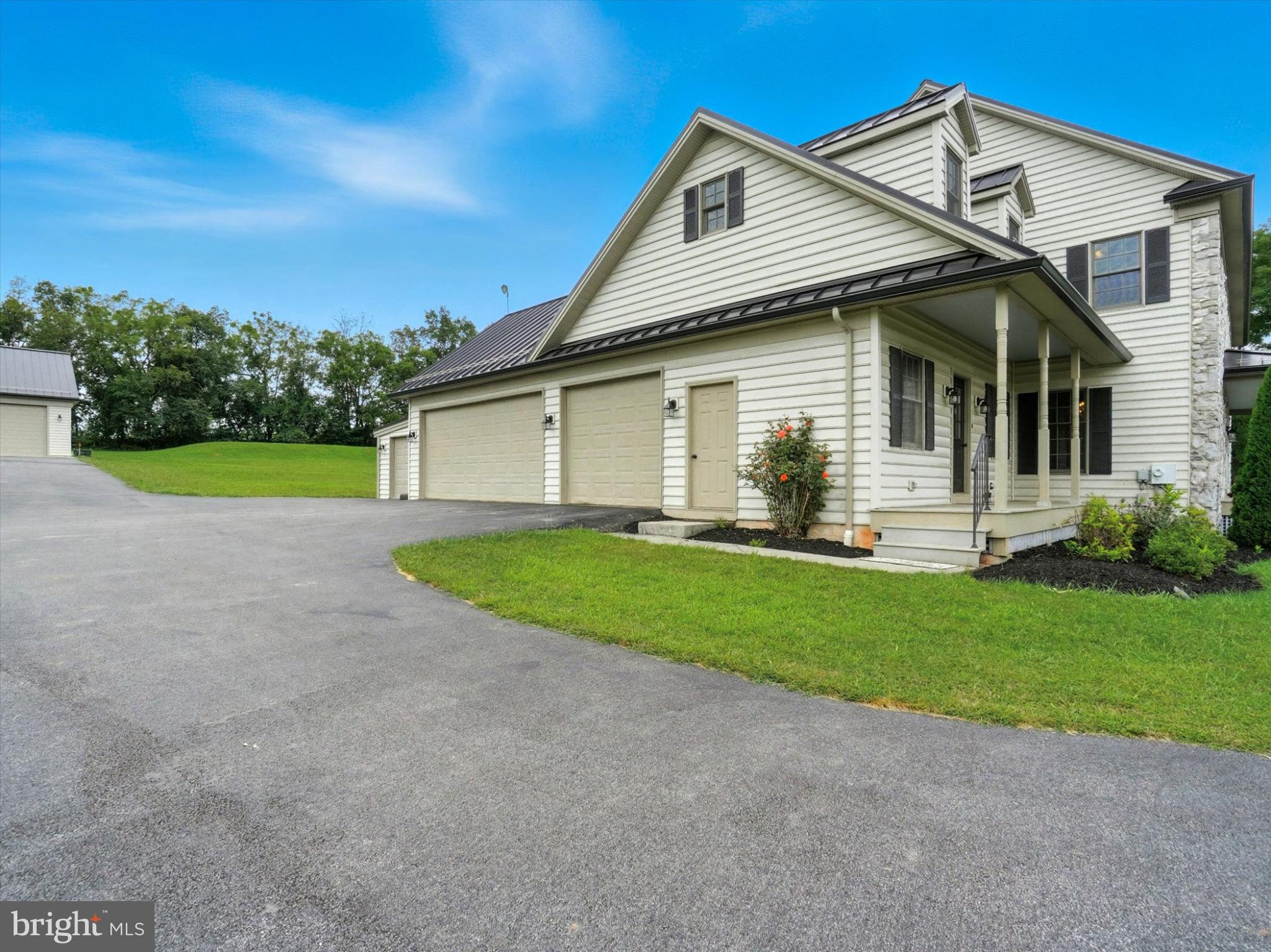 160 Vida Lane Dover, PA 17315 - Photo 50 of 61 a view of a house with a yard and potted plants