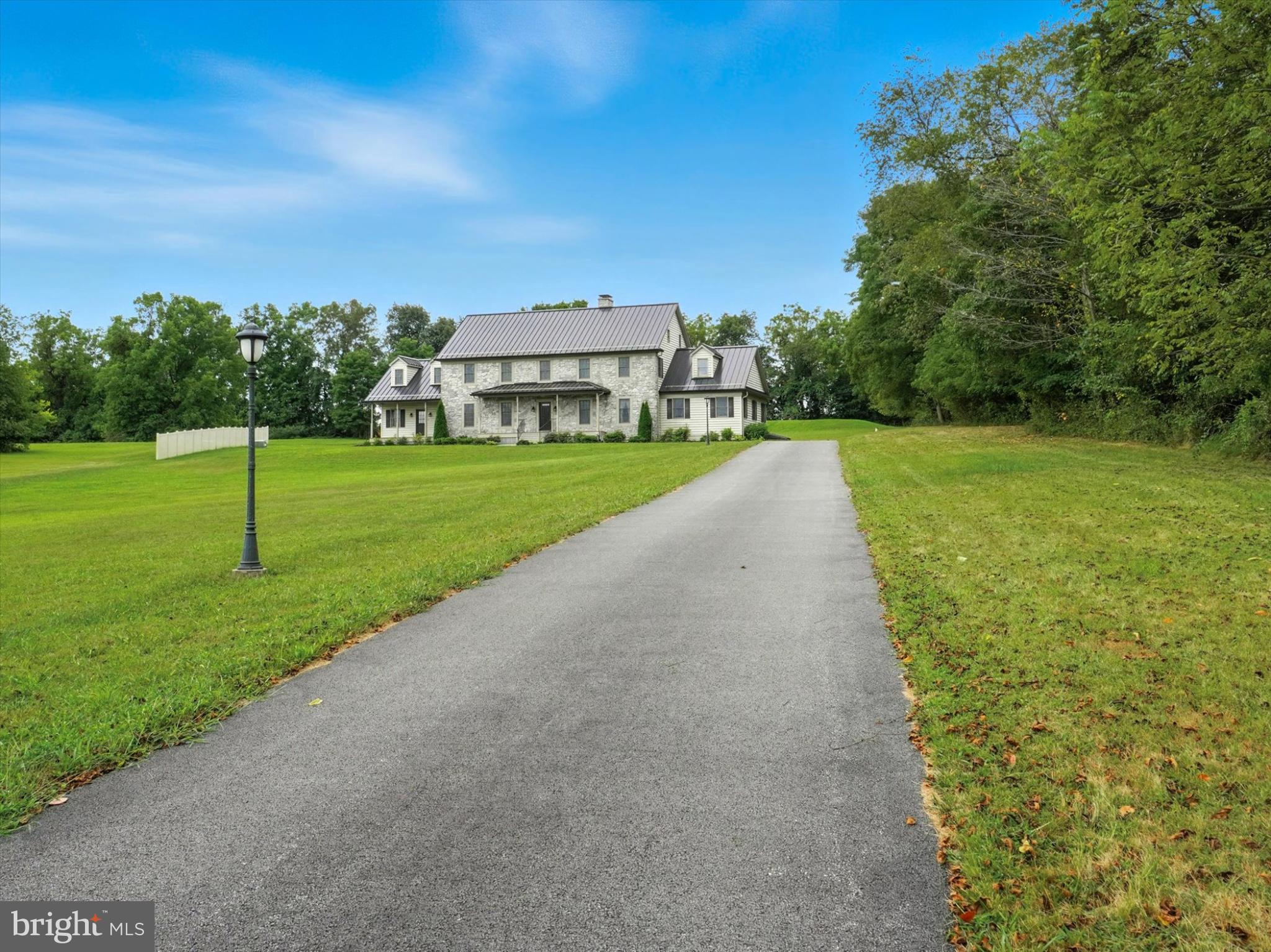 160 Vida Lane Dover, PA 17315 - Photo 53 of 61 a view of a street with a big yard and a large tree