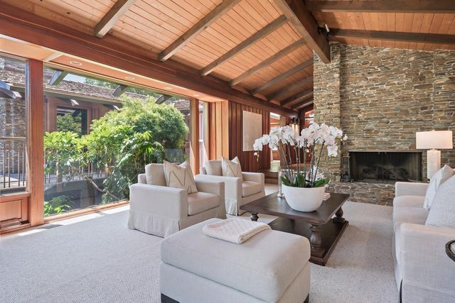 a outdoor living space with furniture and garden view