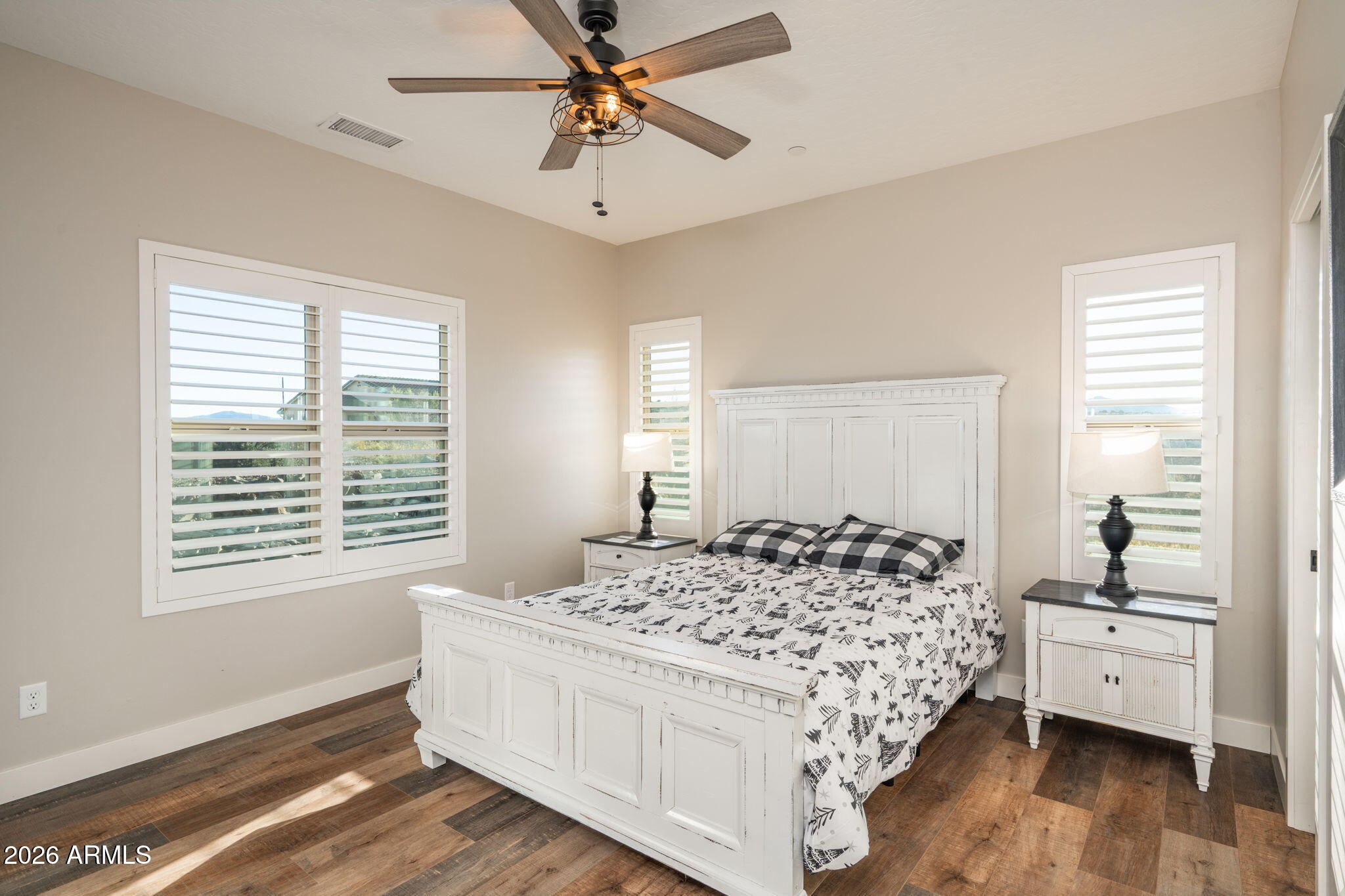15140 East Countryside Road Mayer, AZ 86333 - Photo 20 of 67 a bed room with a bed and a window