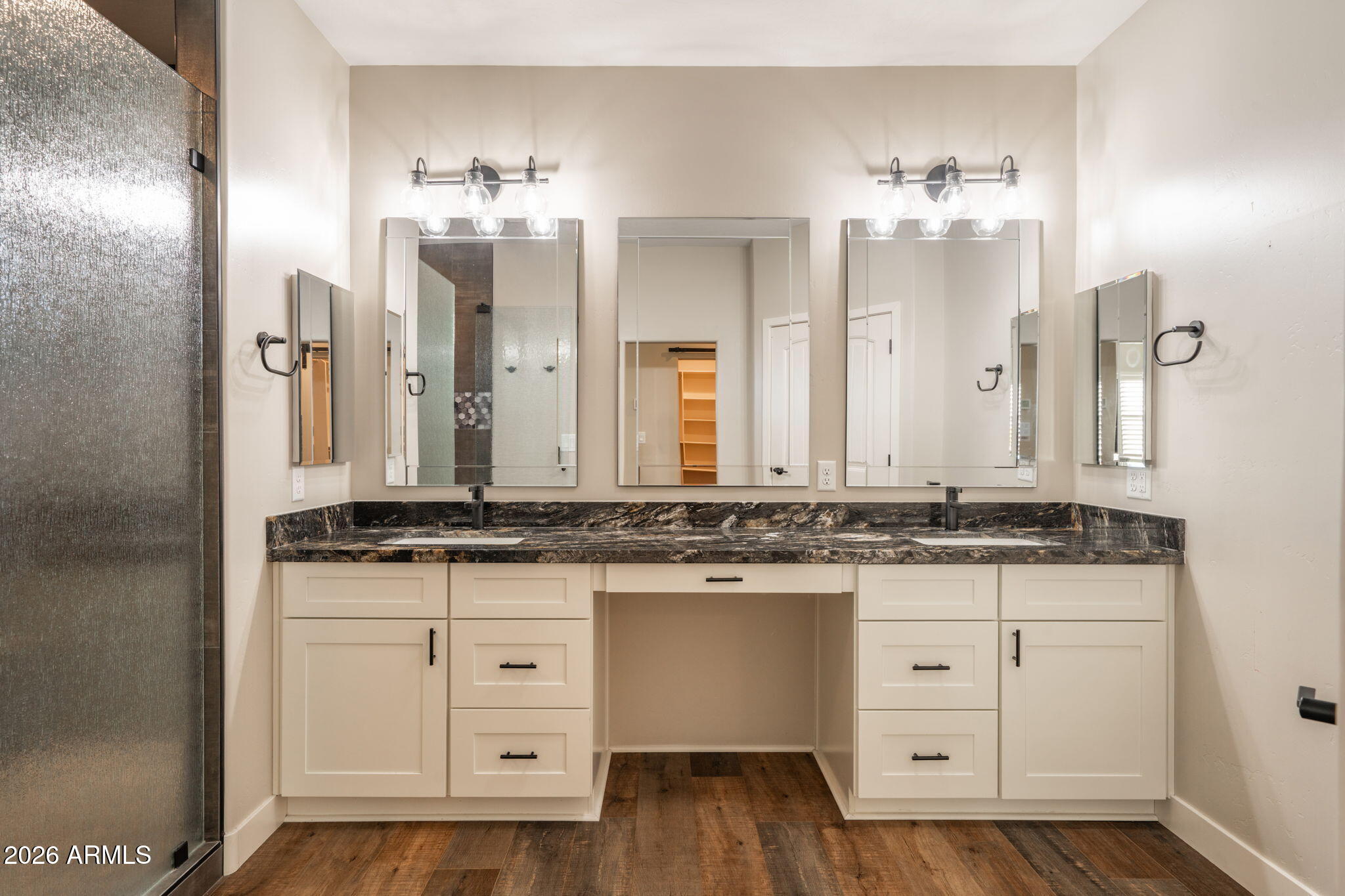15140 East Countryside Road Mayer, AZ 86333 - Photo 24 of 67 a bathroom with a granite countertop sink and a mirror