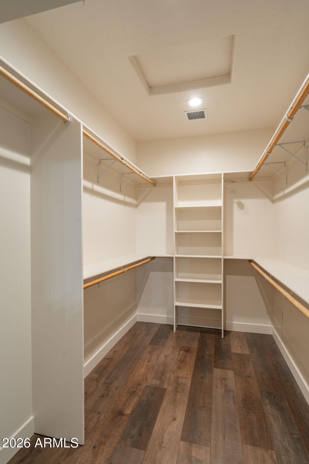15140 East Countryside Road Mayer, AZ 86333 - Photo 27 of 67 a view of walk in closet with empty racks