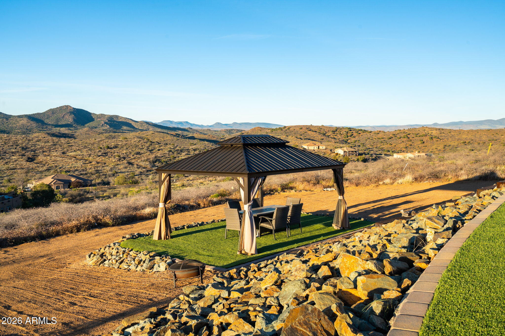 15140 East Countryside Road Mayer, AZ 86333 - Photo 53 of 67 a view of an ocean from a balcony