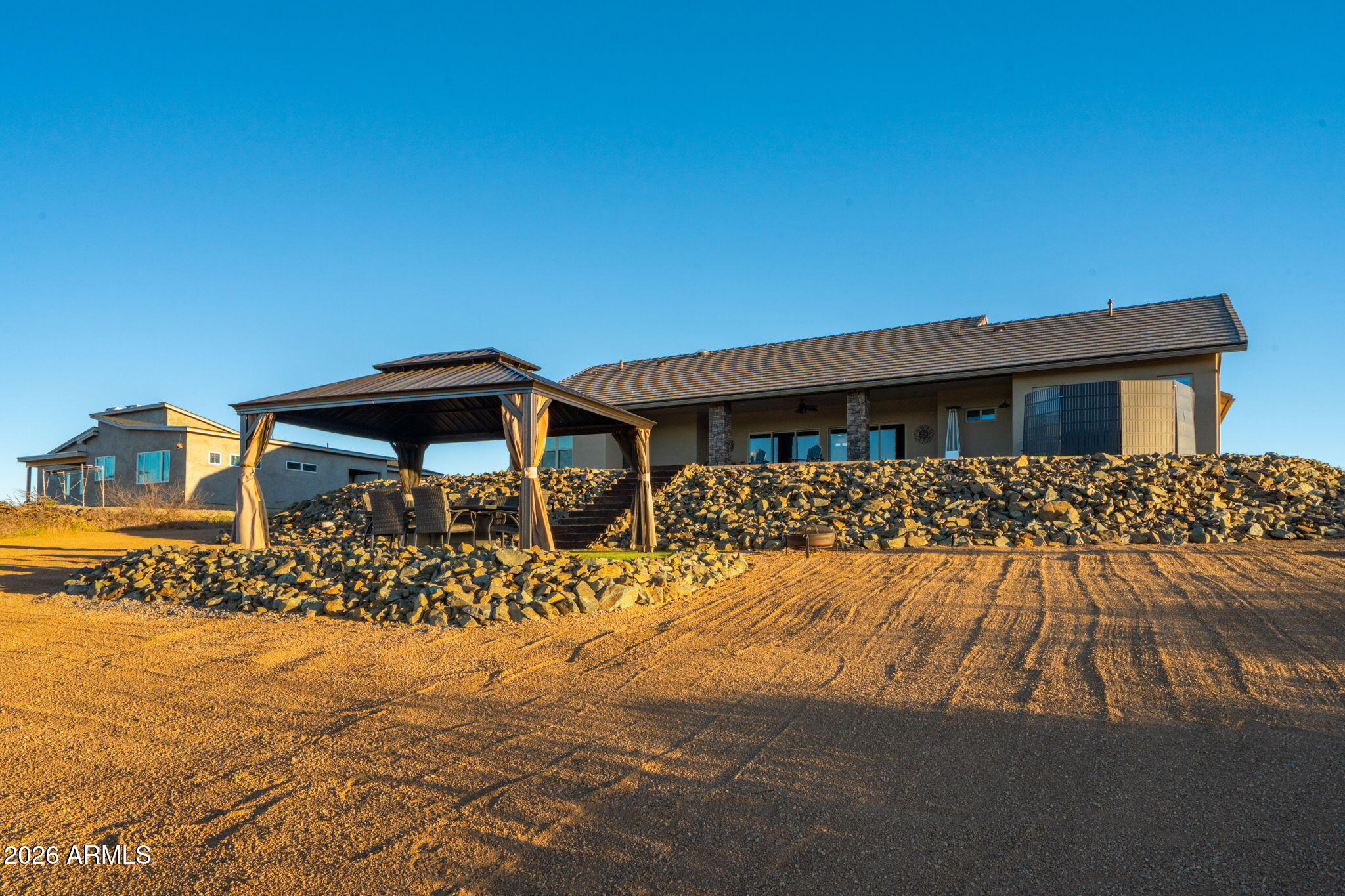 15140 East Countryside Road Mayer, AZ 86333 - Photo 58 of 67 a front view of a house with a yard