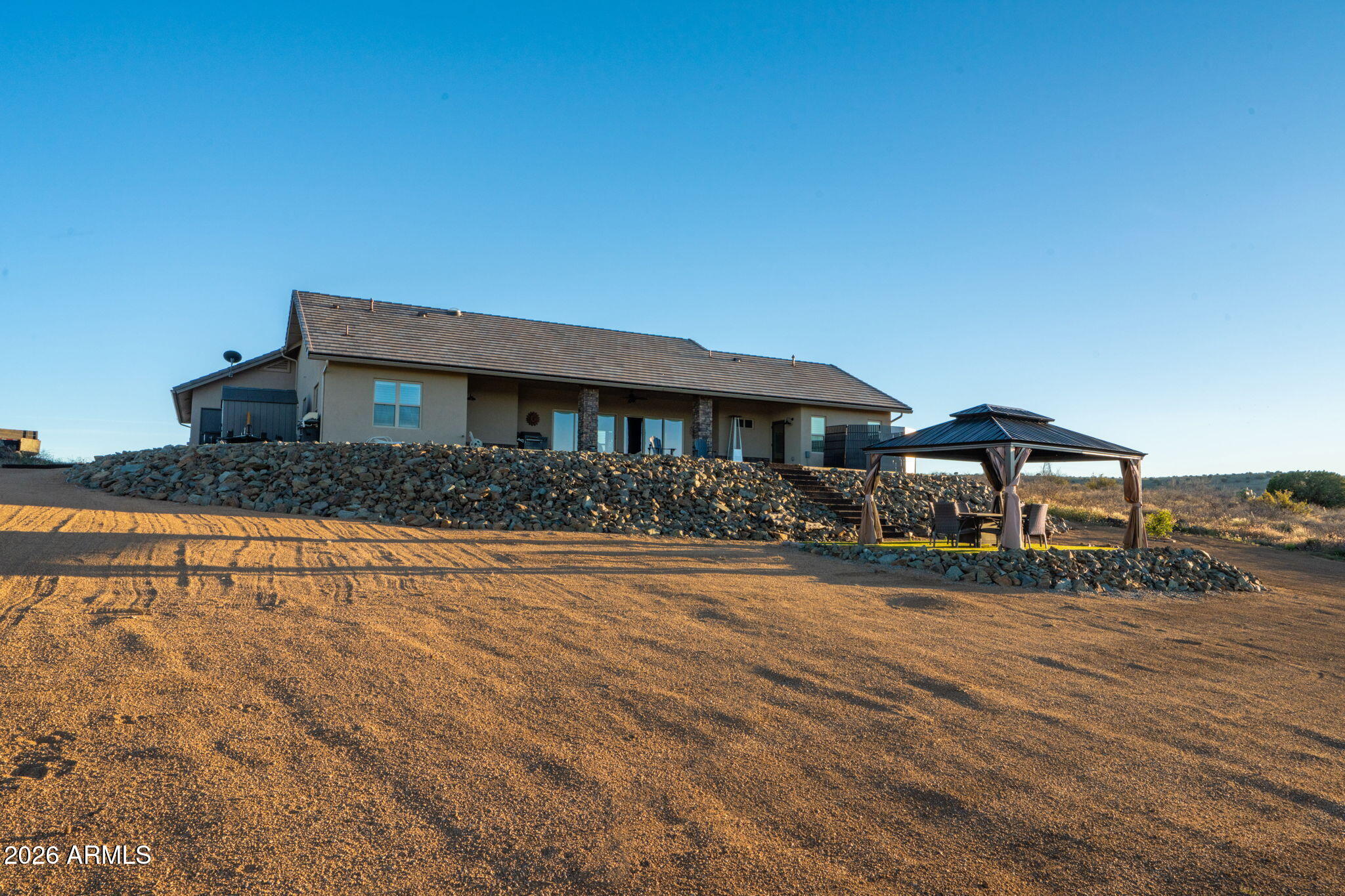 15140 East Countryside Road Mayer, AZ 86333 - Photo 59 of 67 a front view of a house with a yard