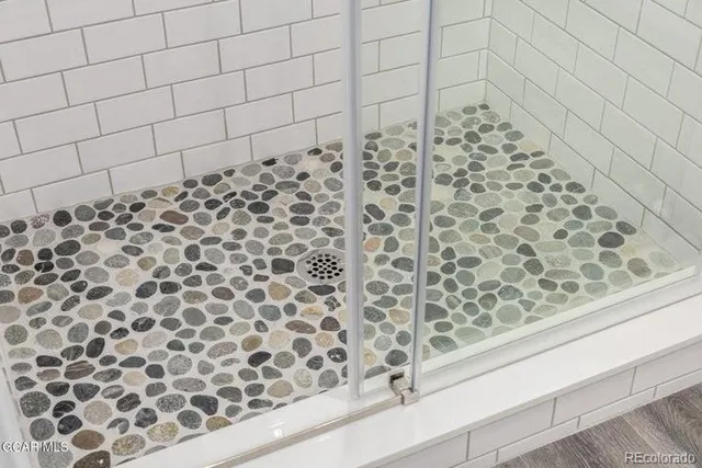 a bathroom with sink and mirror