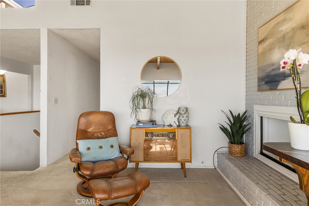 2631 Nutmeg Avenue Morro Bay, CA 93442 - Photo 11 of 39 a living room with furniture and a potted plant