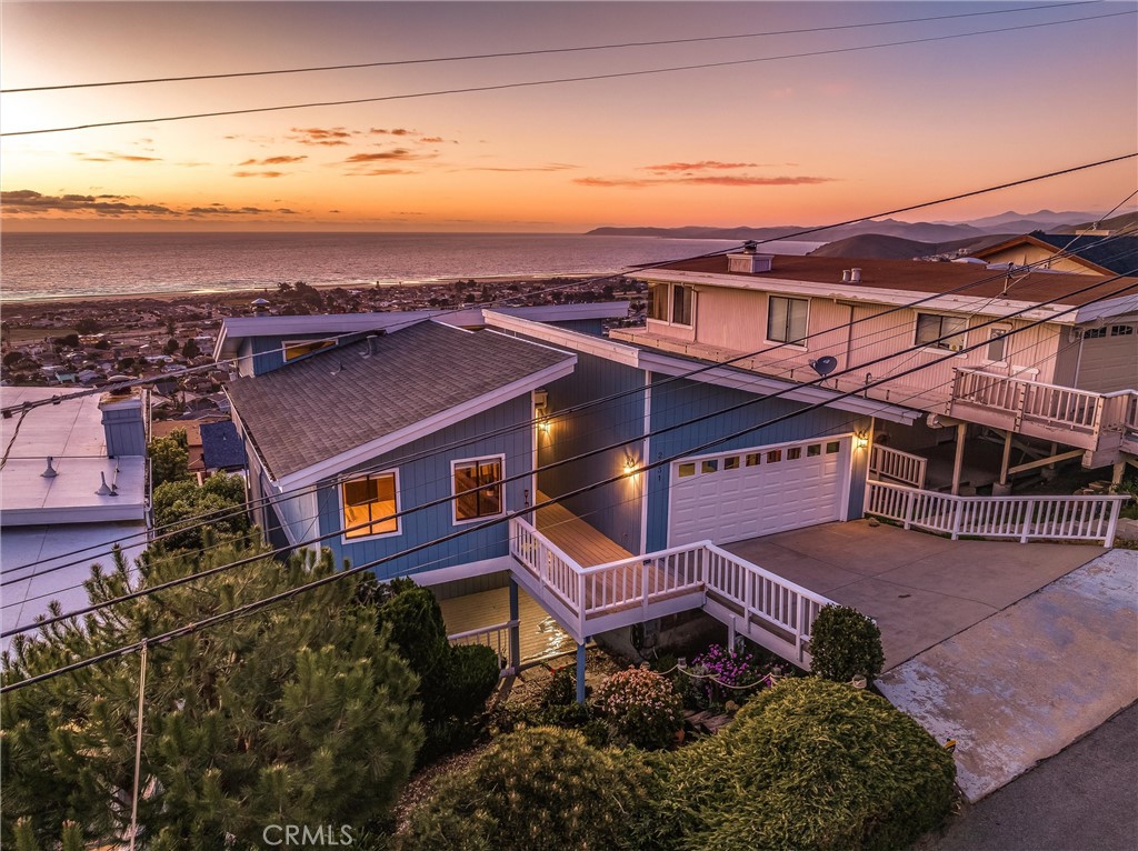2631 Nutmeg Avenue Morro Bay, CA 93442 - Photo 38 of 39 an aerial view of a house with a yard wooden table and chairs