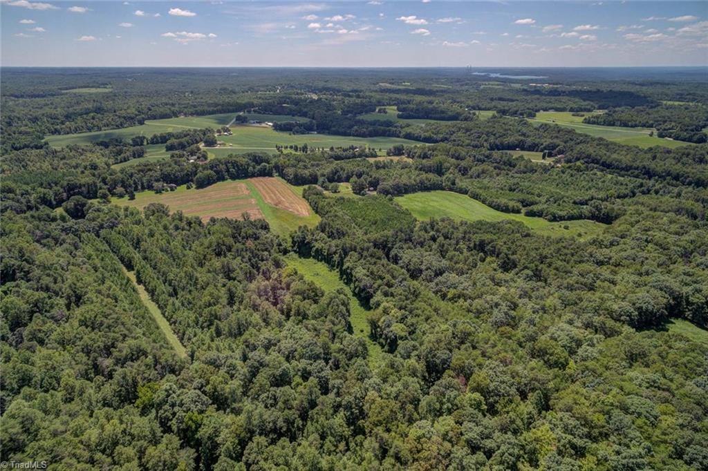 1030 Ellisboro Road Madison, NC 27025 - Photo 3 of 30 Aerial Photo: Taken from the interior of the property, looking back towards Ellisboro Rd (notice Belews Lake in the distance on the right side of the photo)