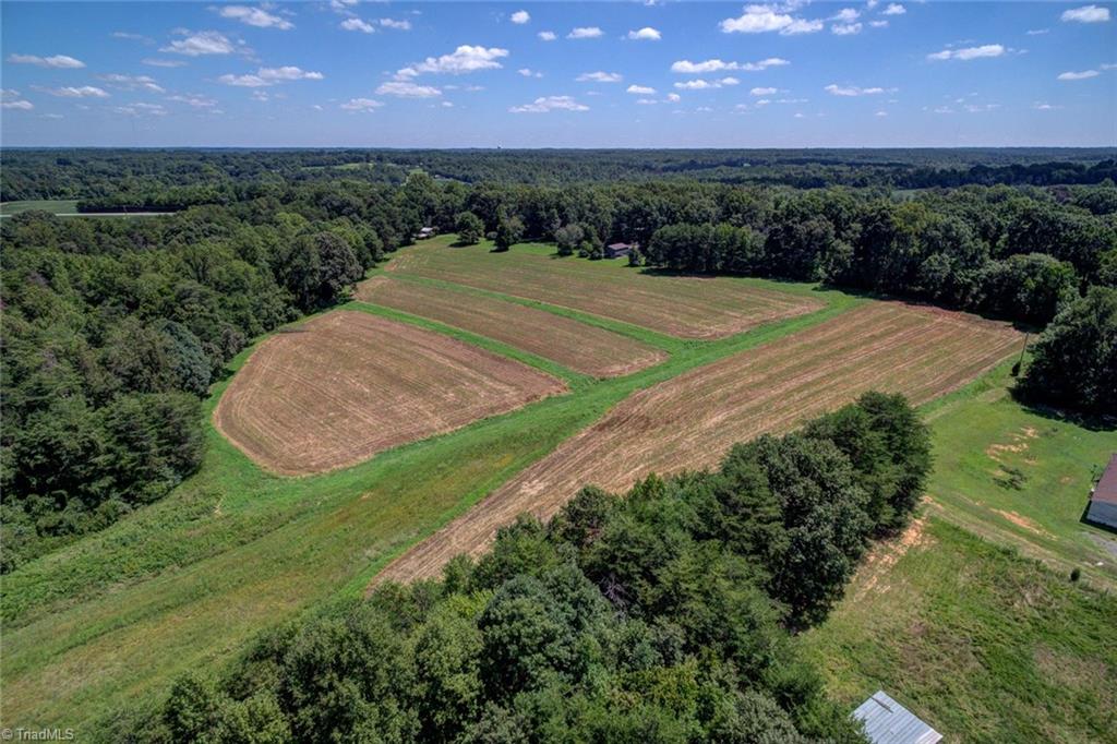 1030 Ellisboro Road Madison, NC 27025 - Photo 5 of 30 Aerial Photo of the largest cleared field area. Property was previously used for crops.