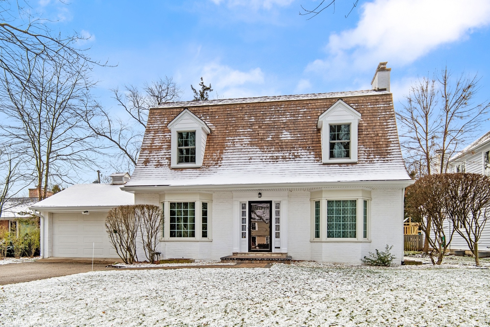 574 Braeside Road Highland Park, IL 60035 - Photo 1 of 29 a front view of a house with a yard