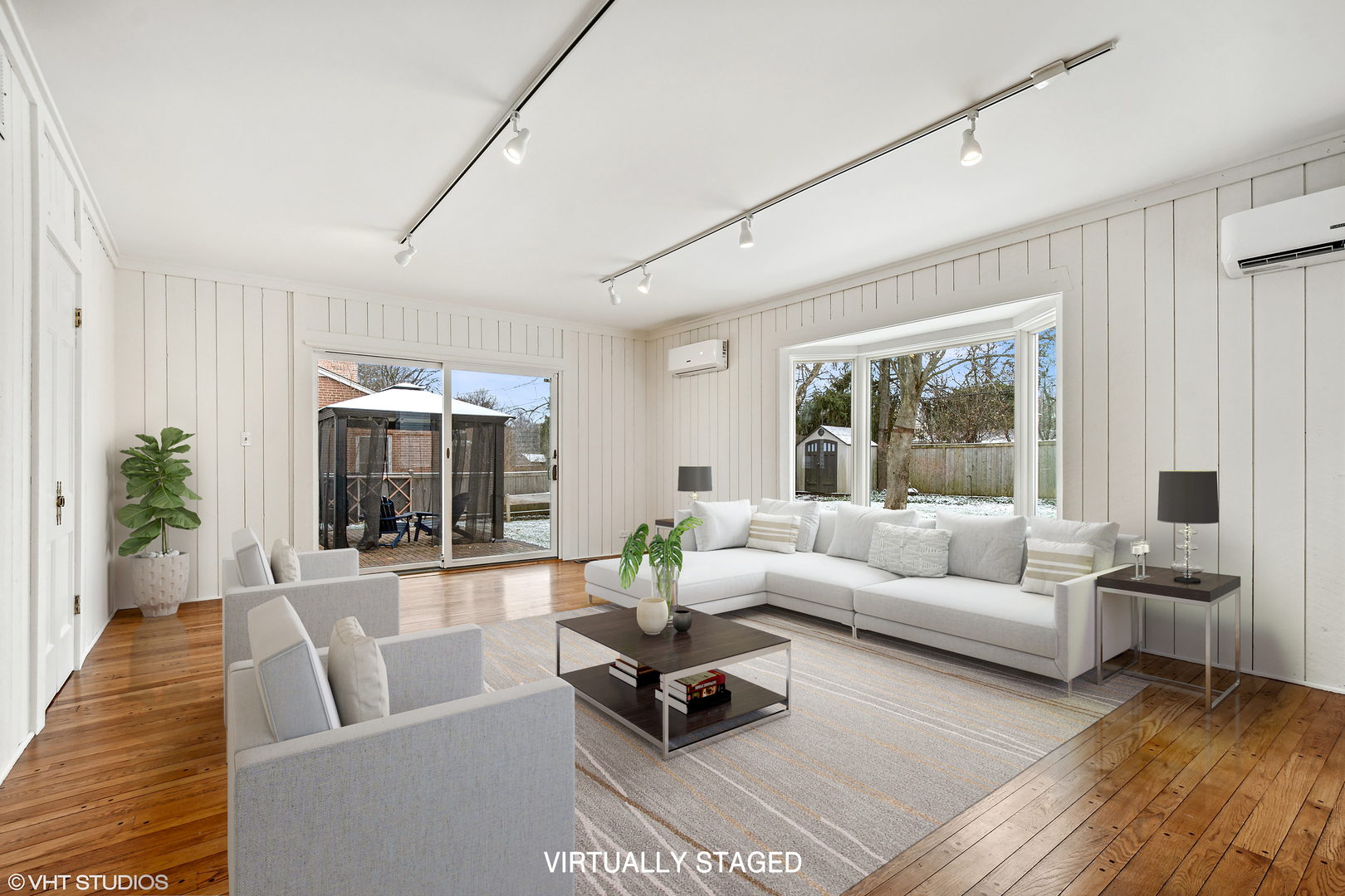 574 Braeside Road Highland Park, IL 60035 - Photo 11 of 29 a living room with furniture and a large window