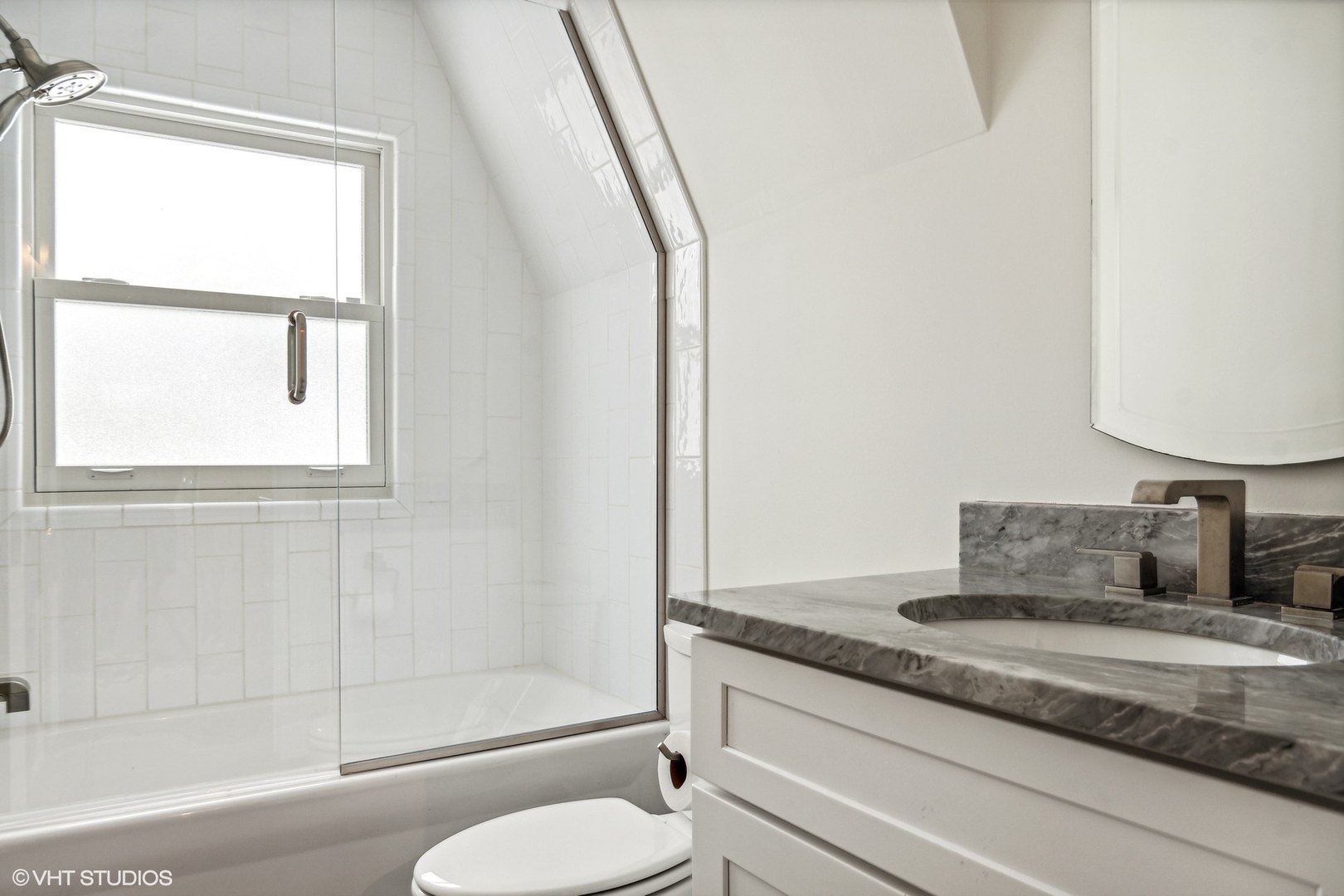 574 Braeside Road Highland Park, IL 60035 - Photo 20 of 29 a bathroom with a granite countertop sink toilet and mirror