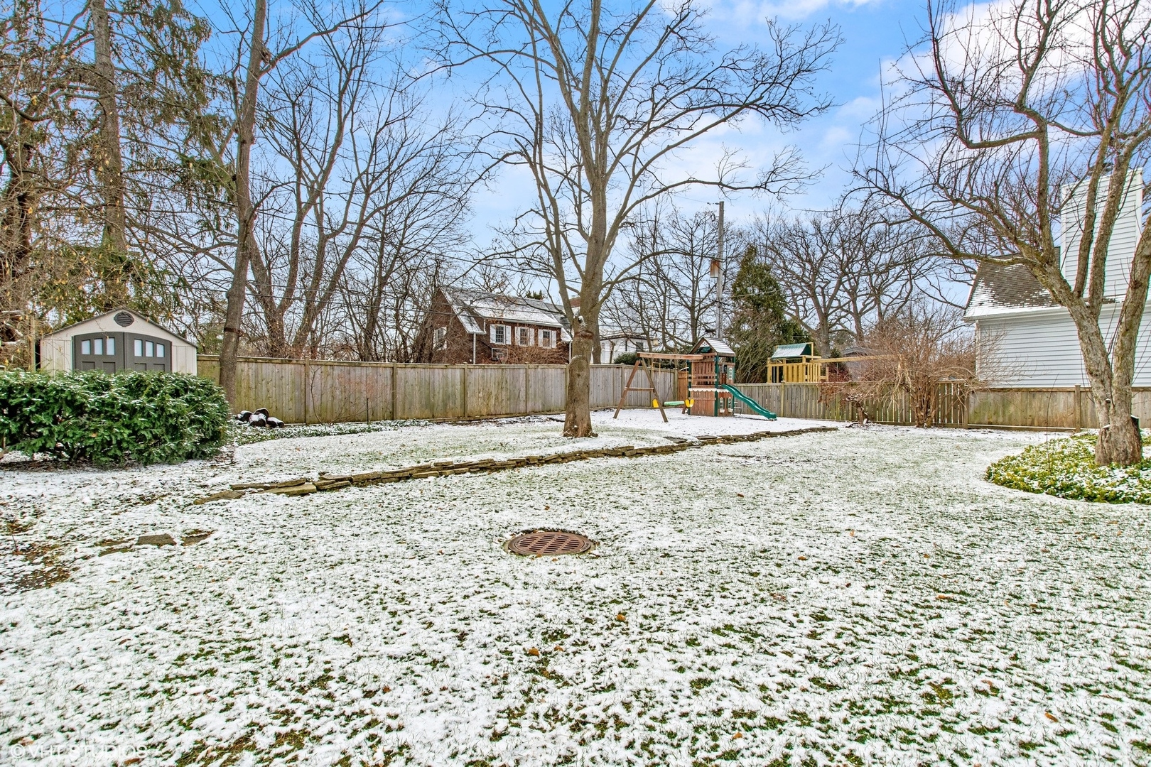 574 Braeside Road Highland Park, IL 60035 - Photo 24 of 29 a view of snow on the side of road