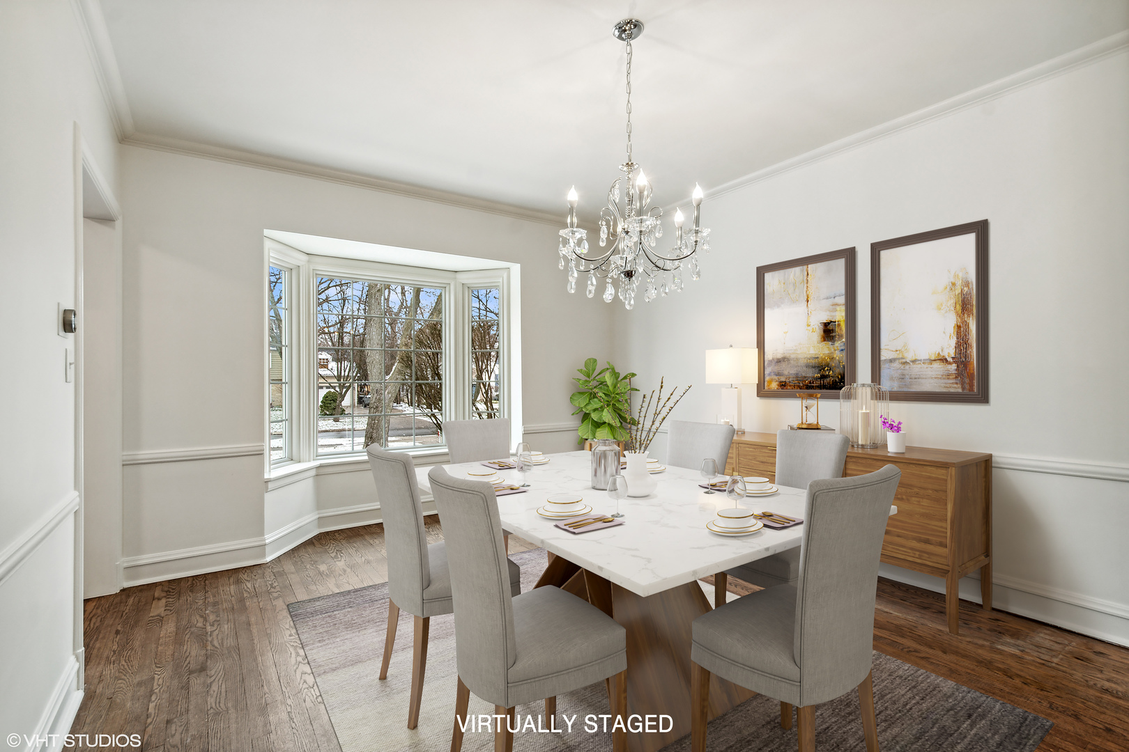 574 Braeside Road Highland Park, IL 60035 - Photo 5 of 29 a view of a dining room with furniture wooden floor and chandelier