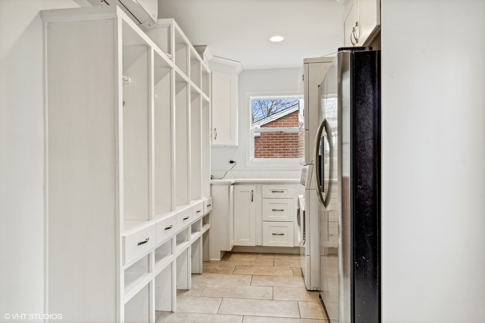 574 Braeside Road Highland Park, IL 60035 - Photo 8 of 29 a bathroom with a double vanity sink and mirror